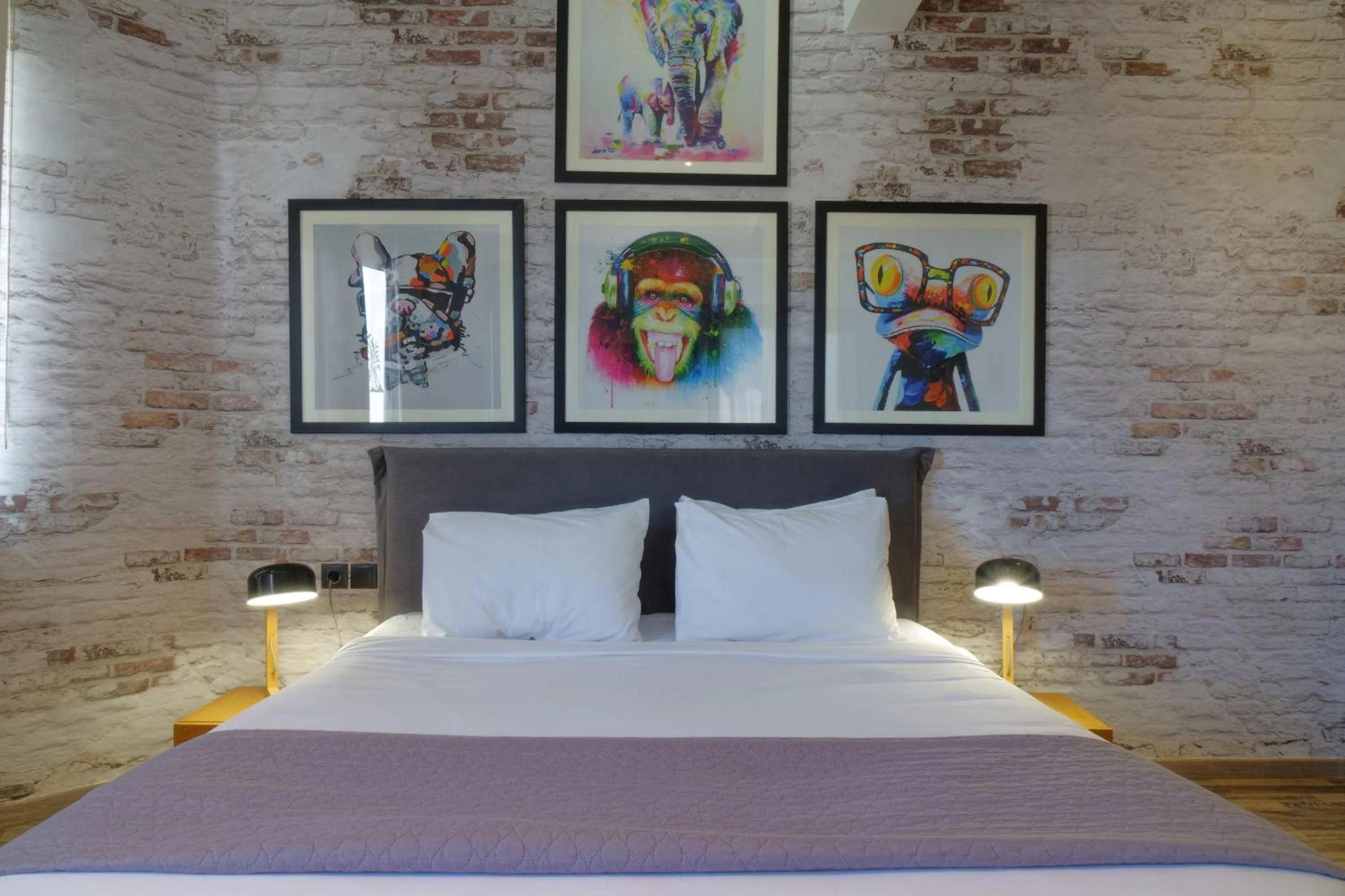 Bed in The Athens Version Luxury Suites