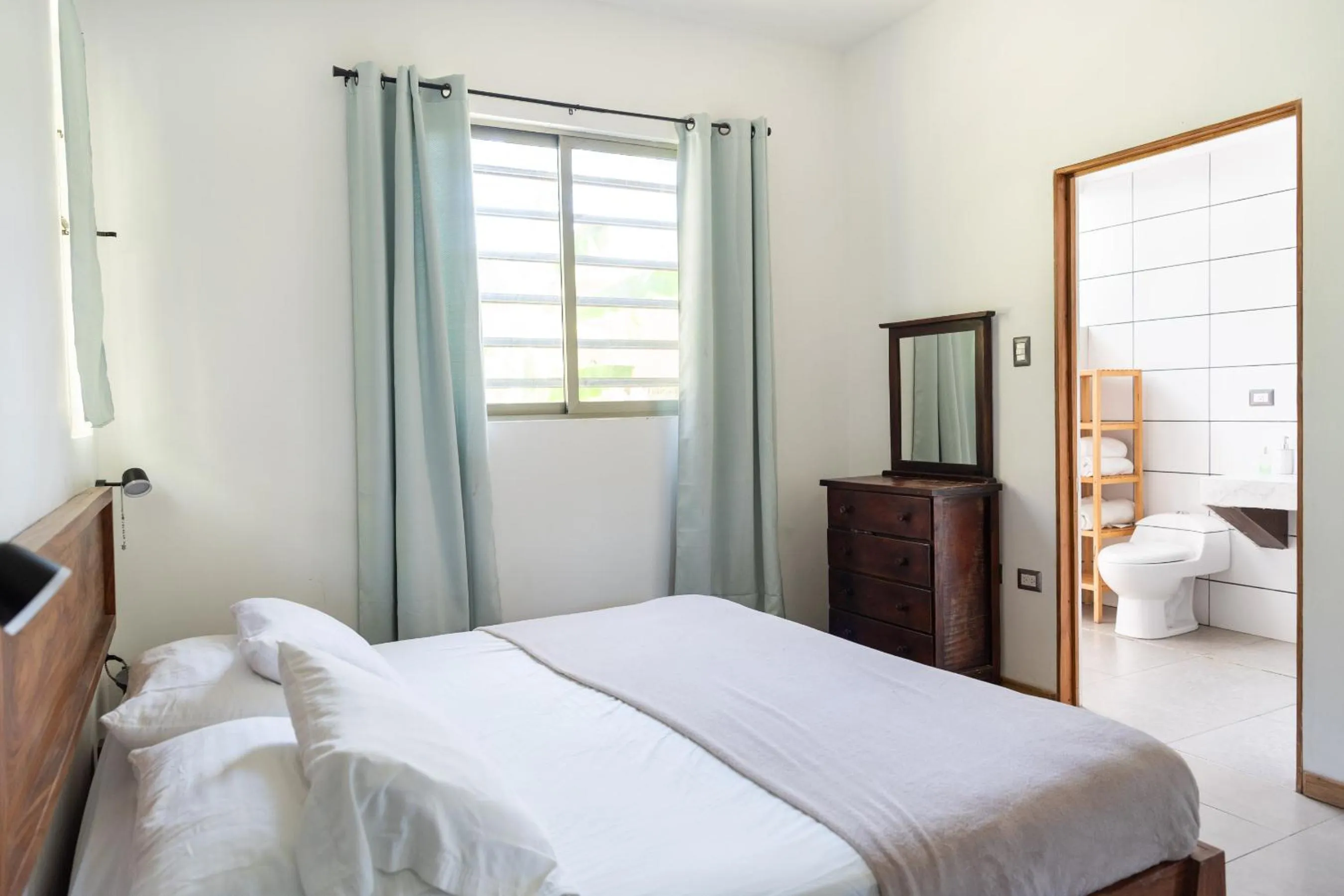 Bed in Nautilus Surf & Yoga Villas Santa Teresa