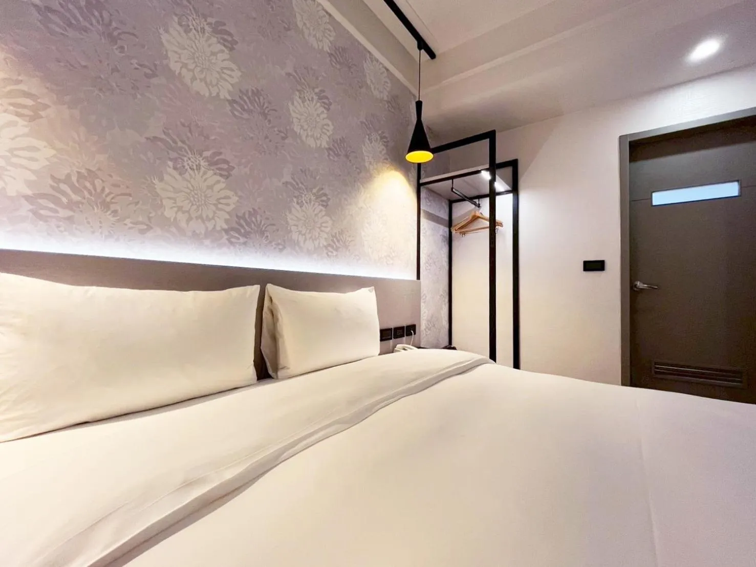 Bed in Dolamanco Hotel