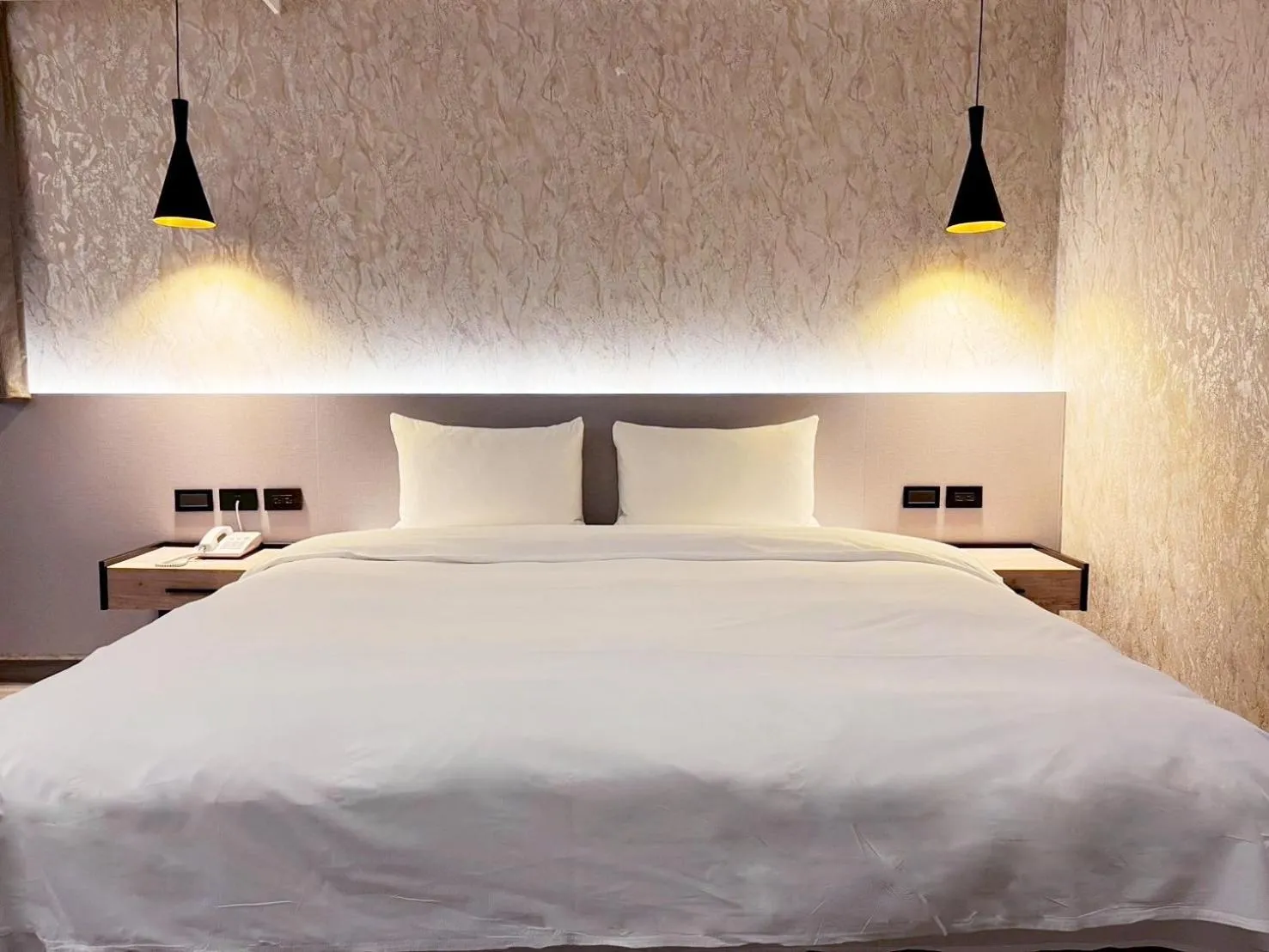 Bed in Dolamanco Hotel