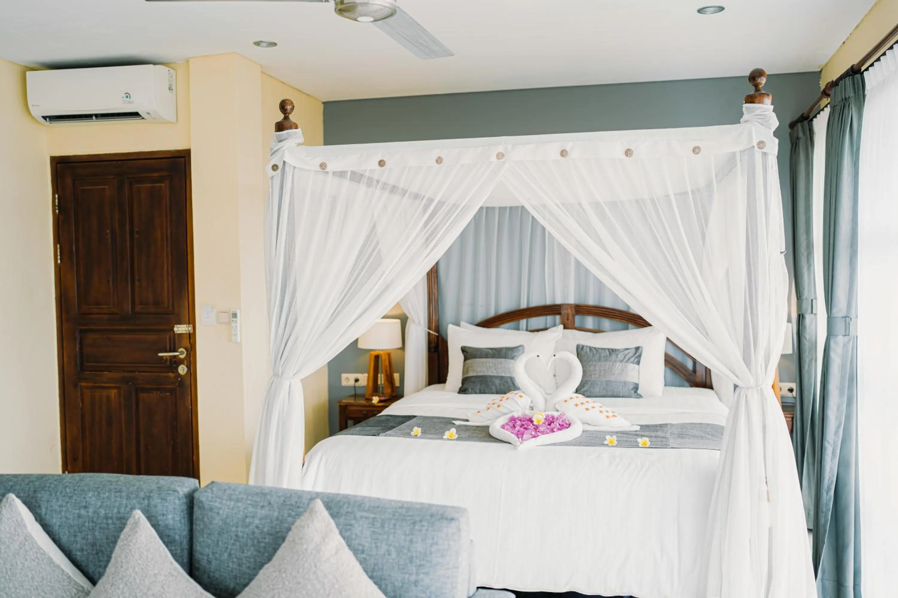 Bed in Puri Wirata Dive Resort and Spa Amed