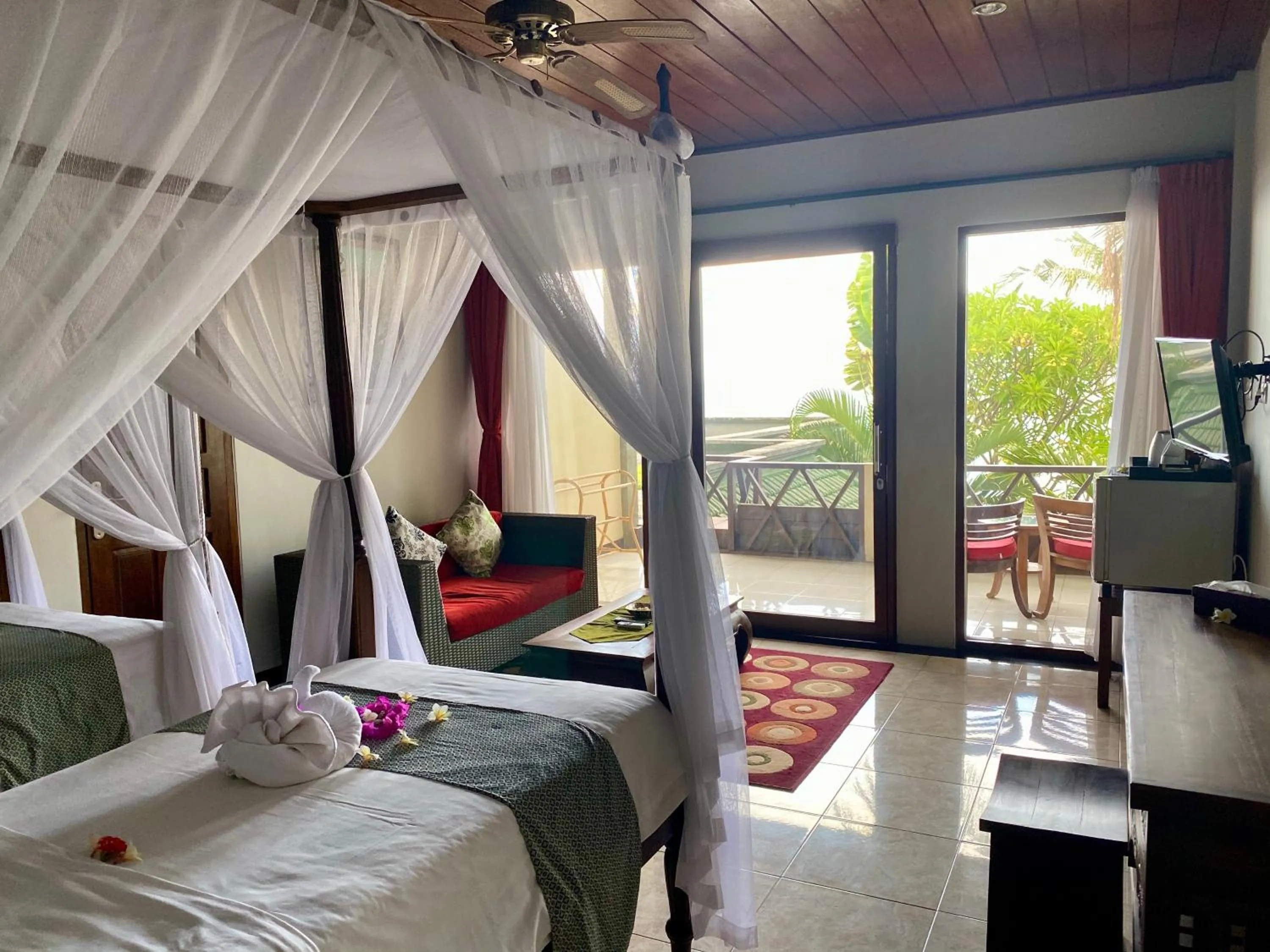 Photo of the whole room, Bed in Puri Wirata Dive Resort and Spa Amed