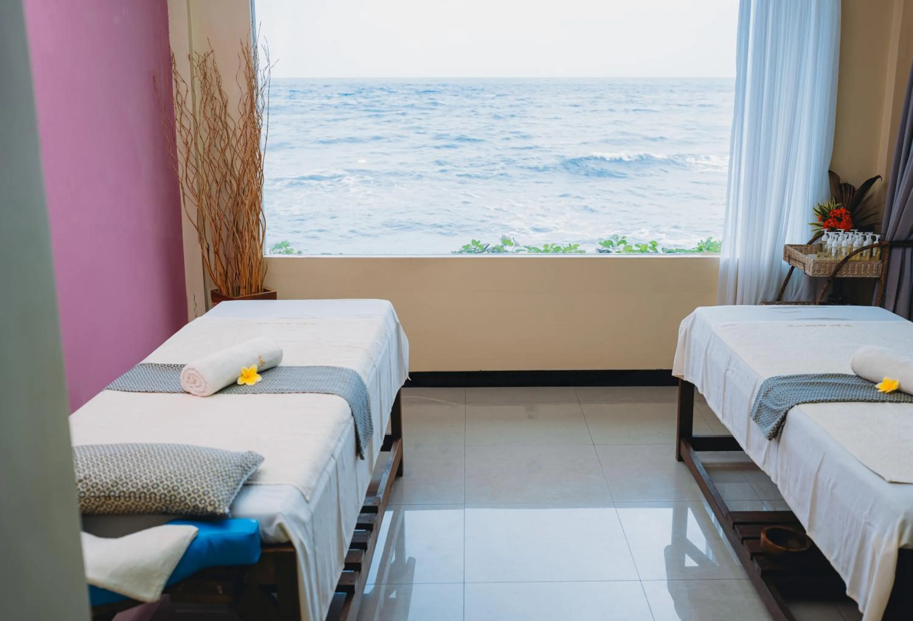 Bed in Puri Wirata Dive Resort and Spa Amed