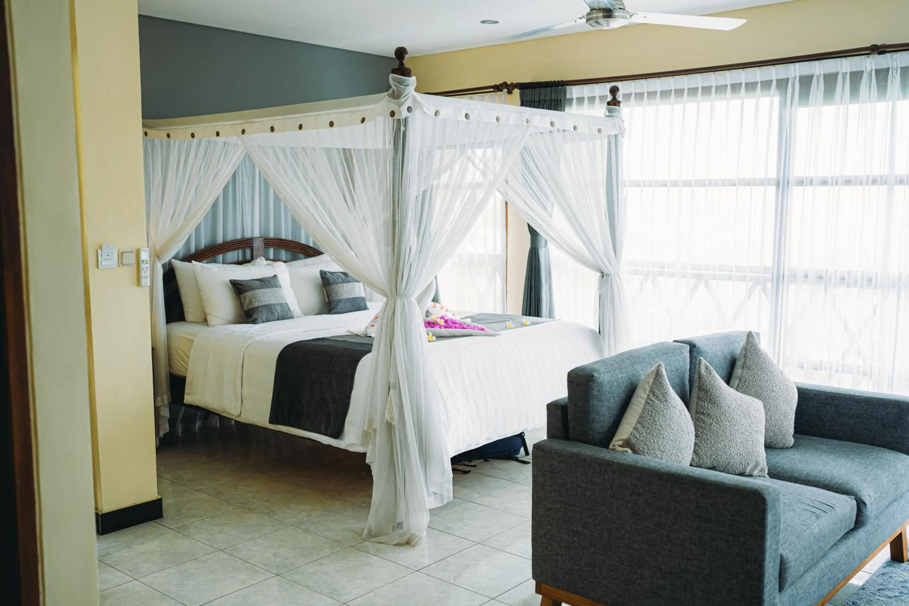 Bed in Puri Wirata Dive Resort and Spa Amed