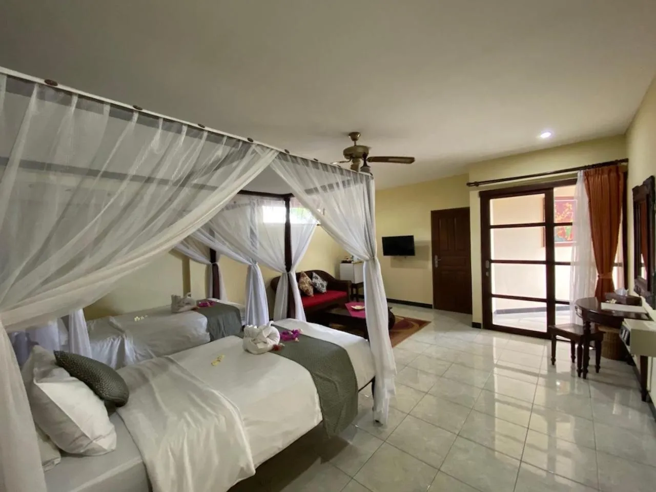 Bed in Puri Wirata Dive Resort and Spa Amed