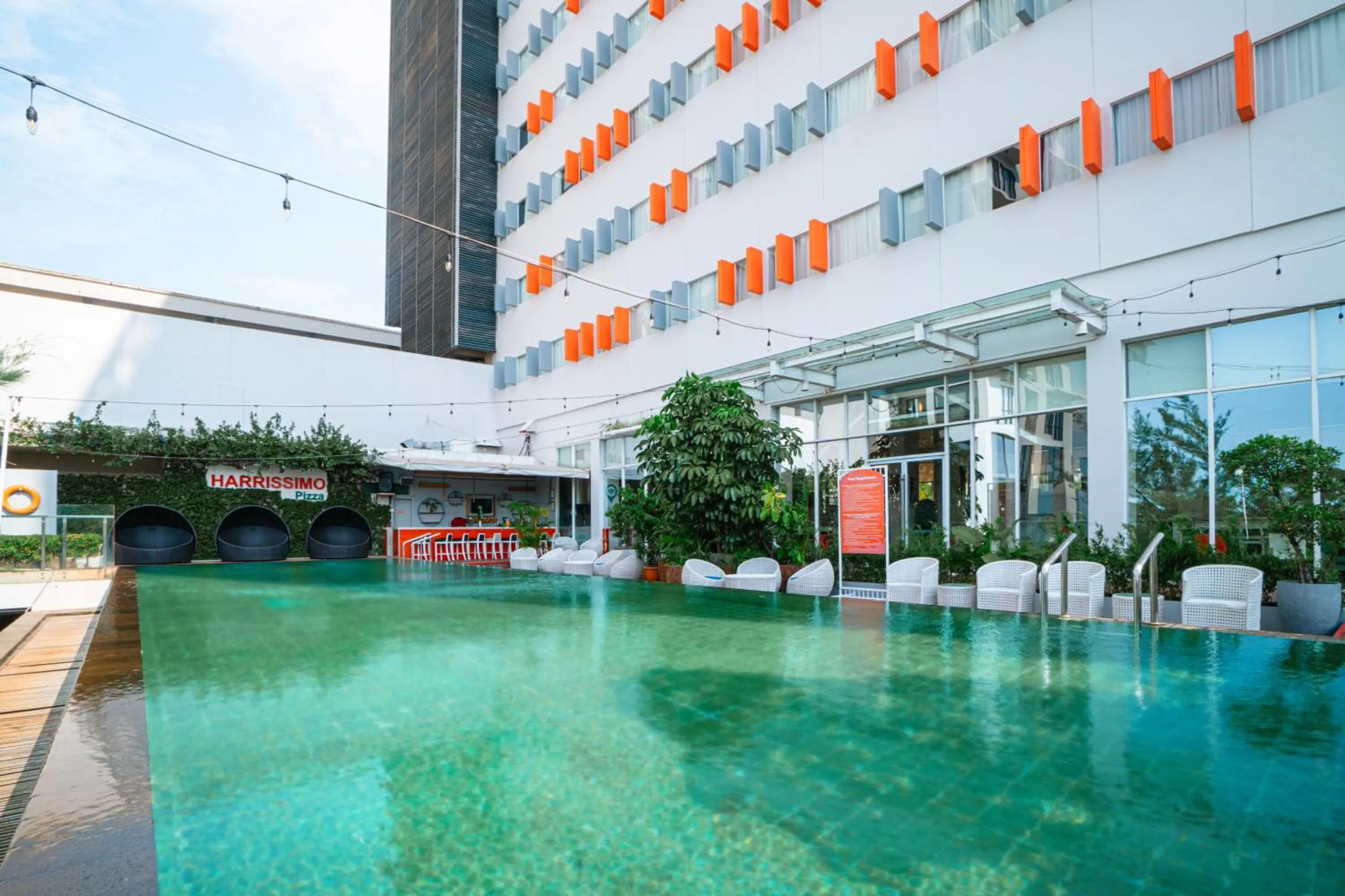 Swimming pool in HARRIS Hotel Batam Center
