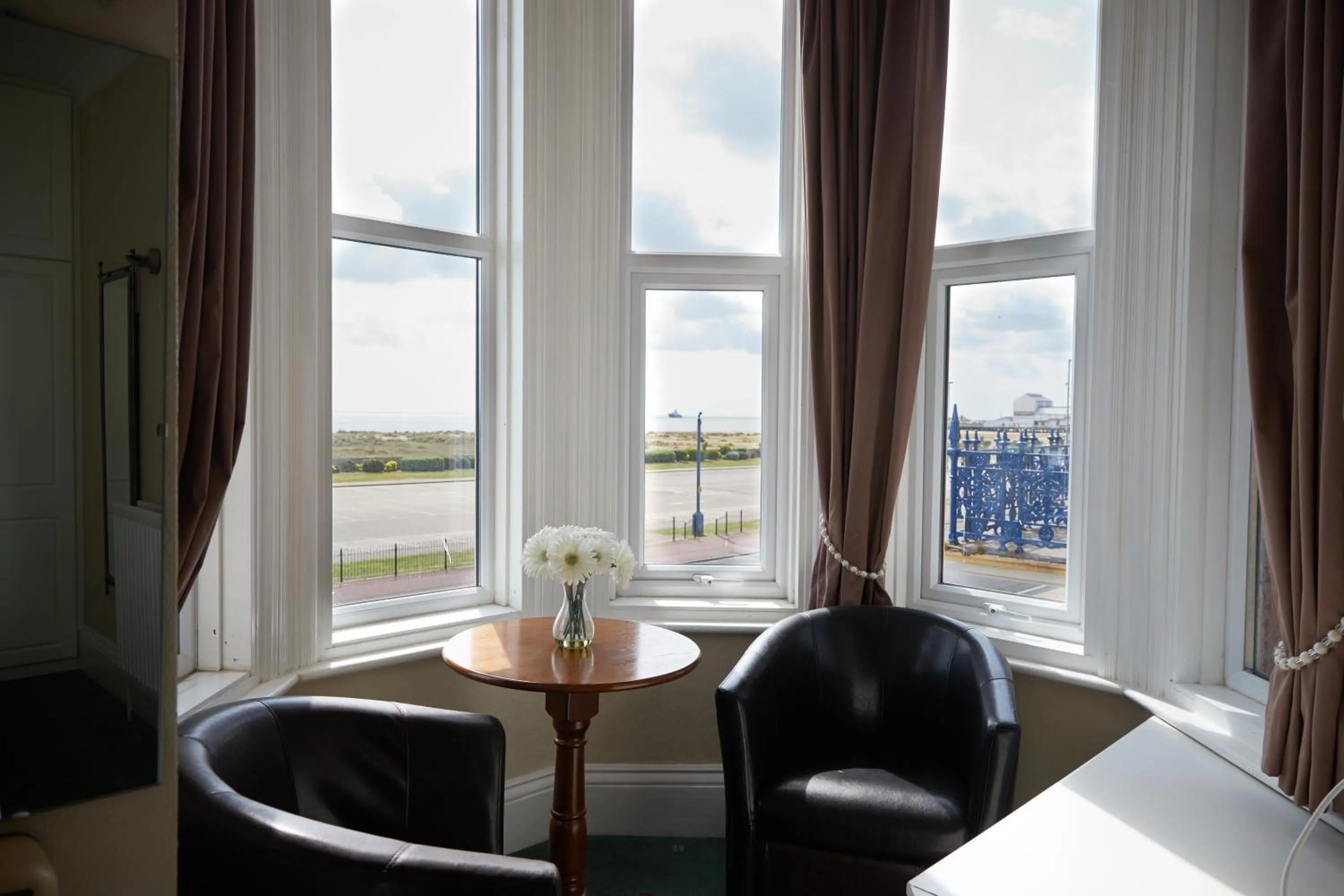 Bedroom in Palm Court Hotel