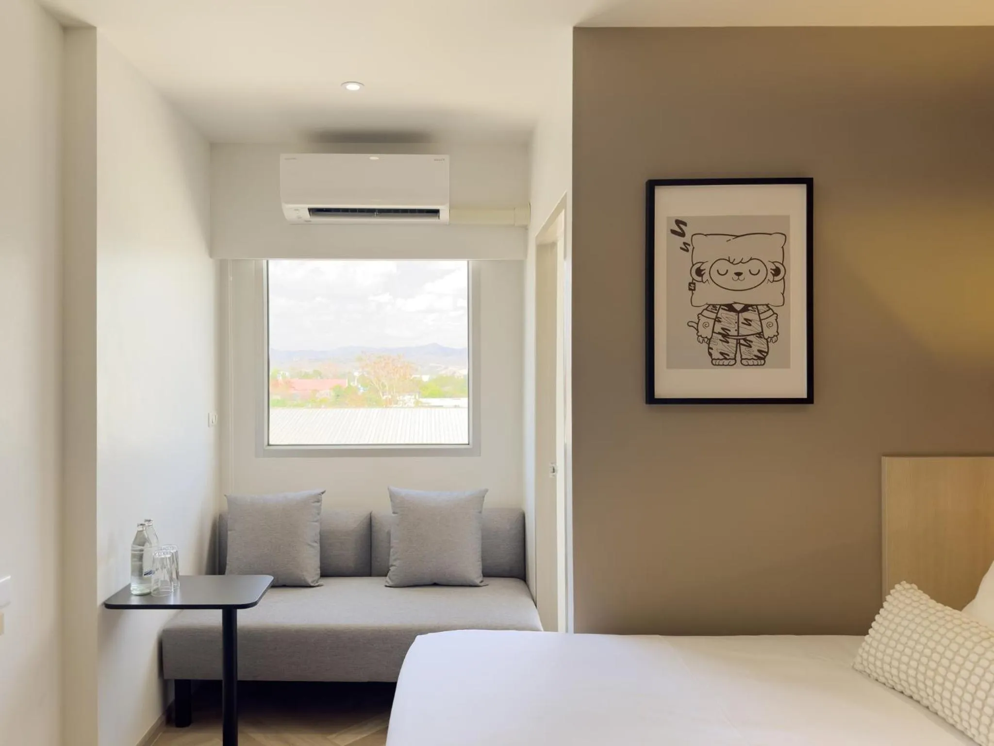 Bed in Fortune D Hotel Loei