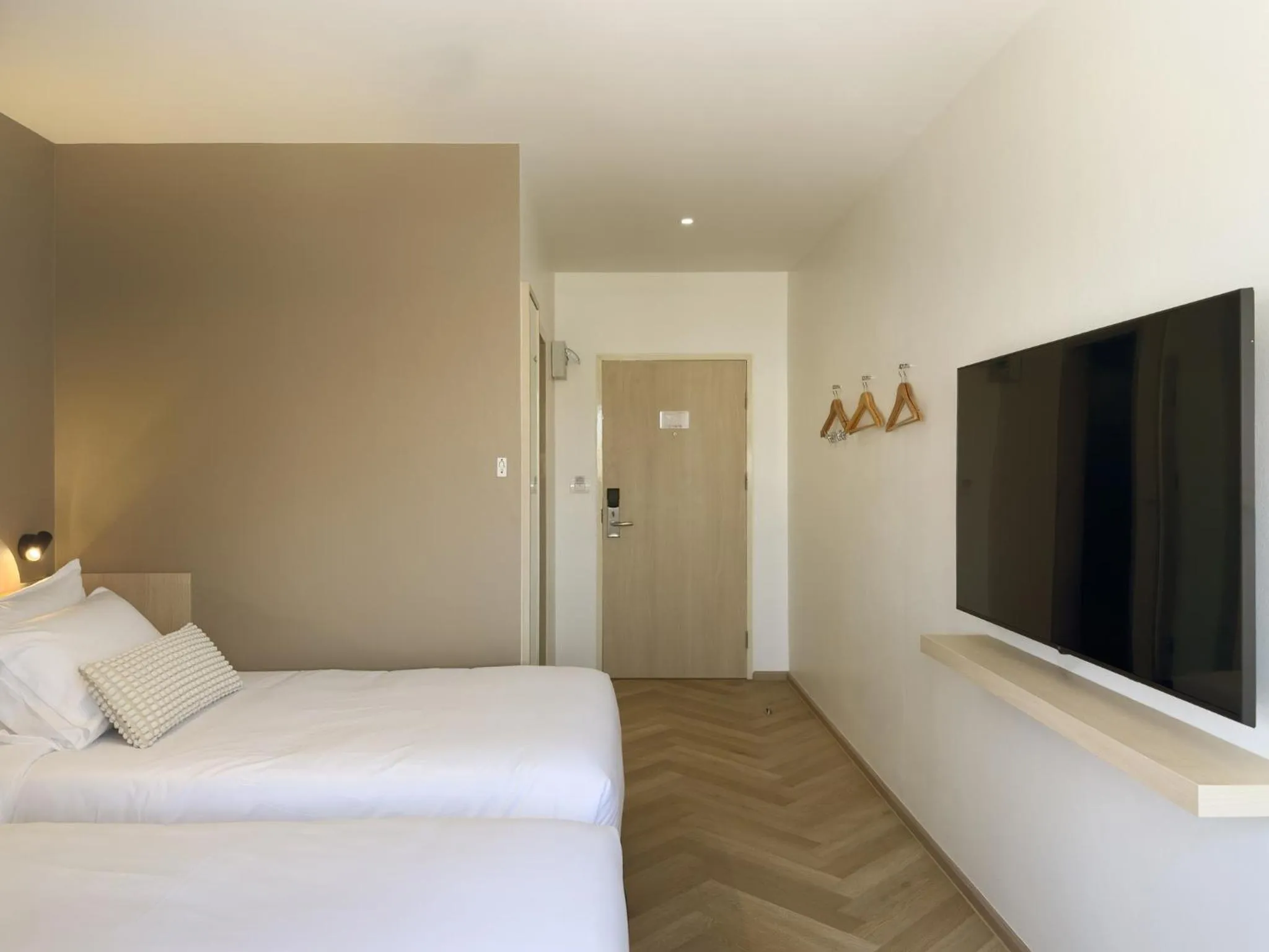 Bed in Fortune D Hotel Loei