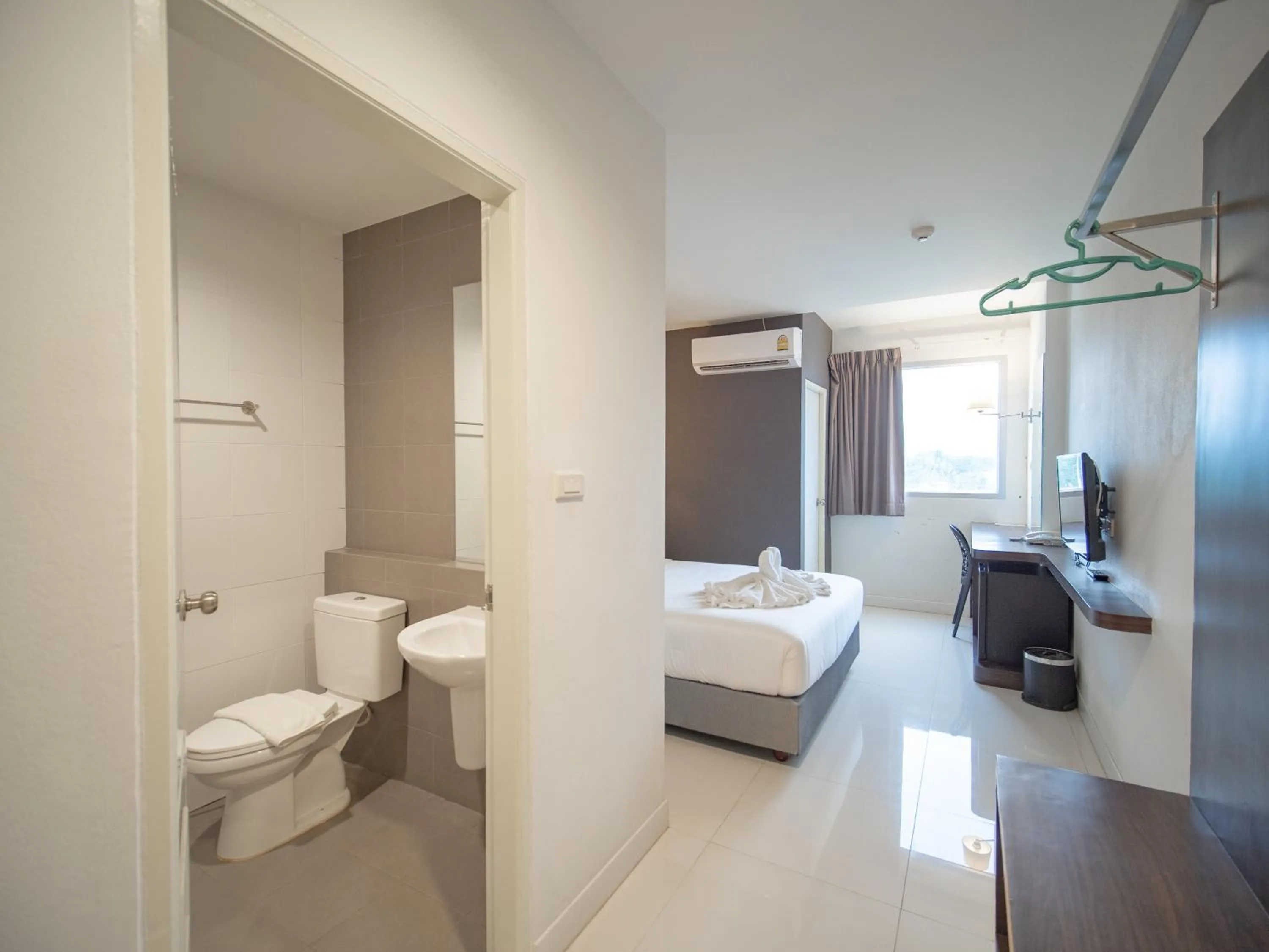 Bed in Fortune D Hotel Loei