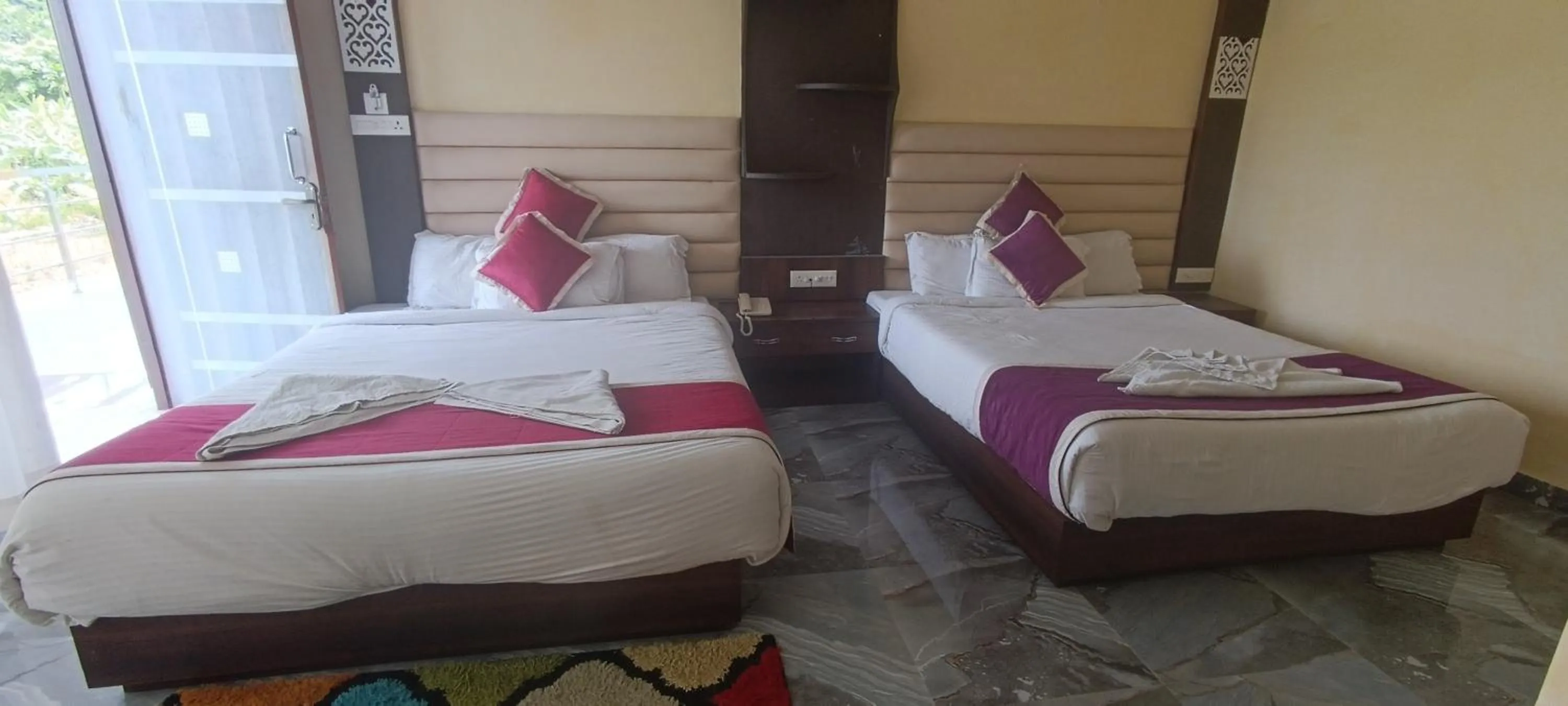 Bed in Joye Grand Hotel