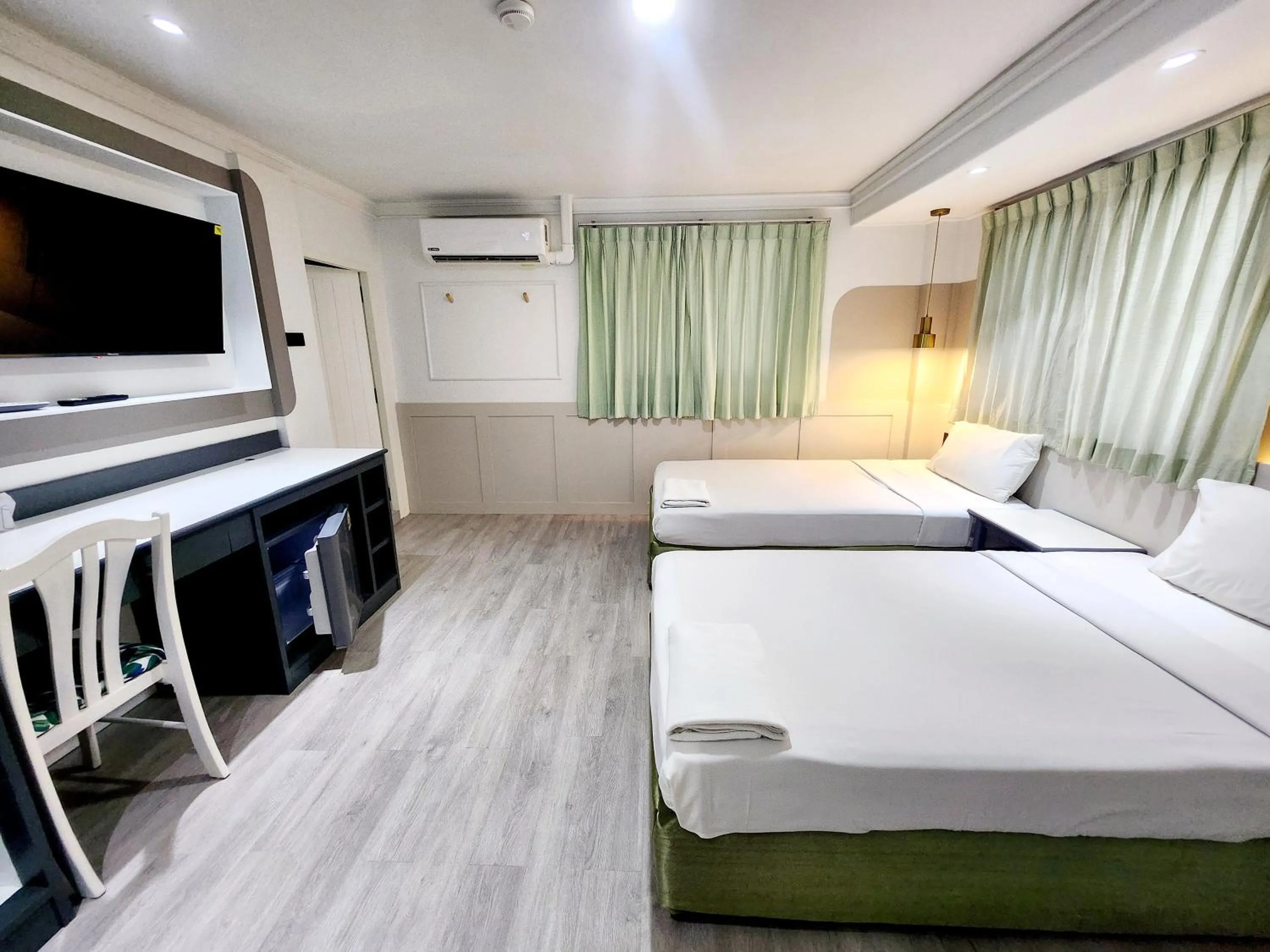 Photo of the whole room, Bed in SEATEL Phuket, Patong Beach