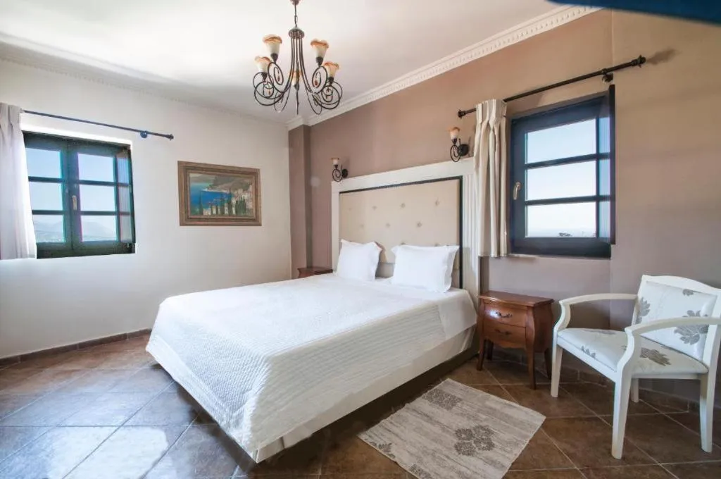 Bed in Areos Polis Boutique Hotel