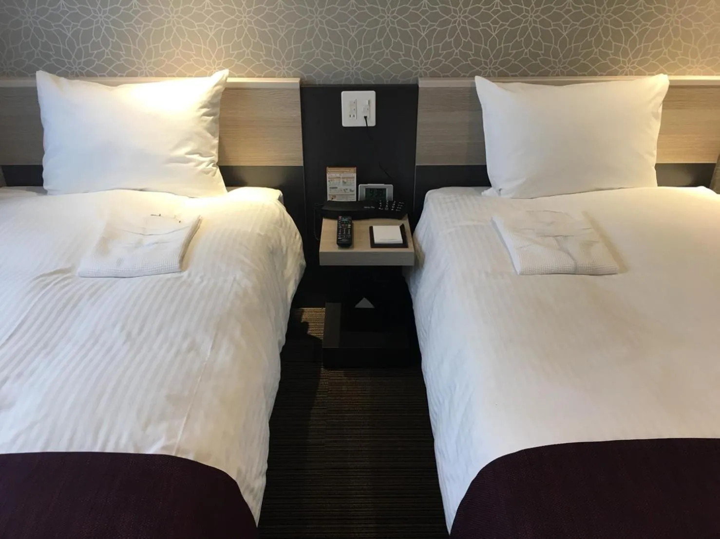 Bed in Kuretake Inn Osaka Sakaisuji Honmachi