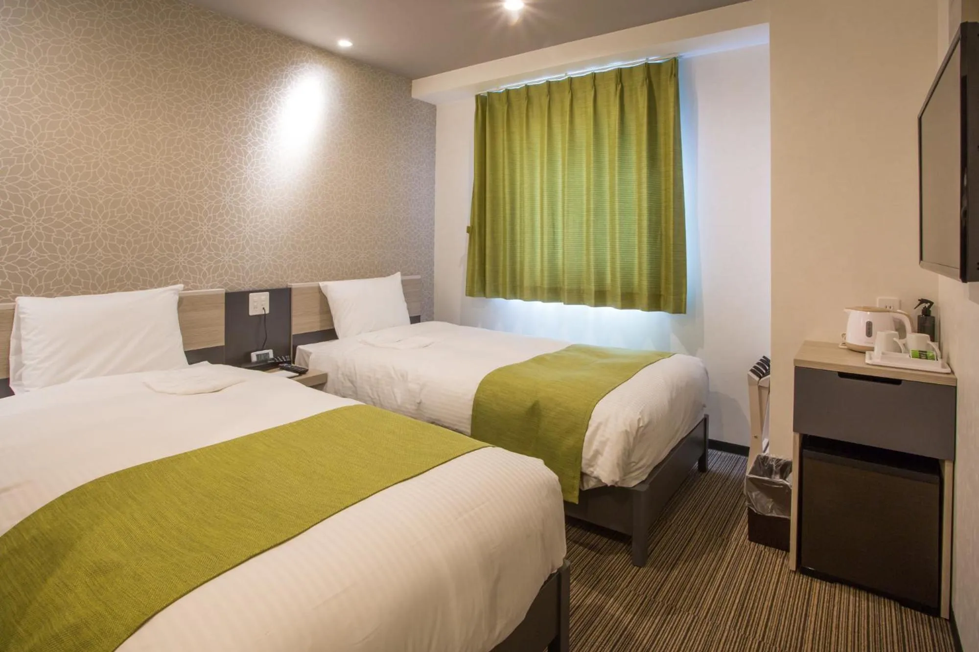 Bed in Kuretake Inn Osaka Sakaisuji Honmachi