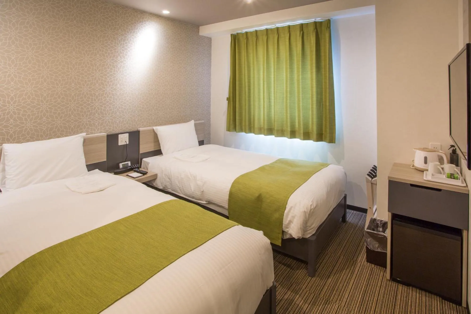 Bed in Kuretake Inn Osaka Sakaisuji Honmachi