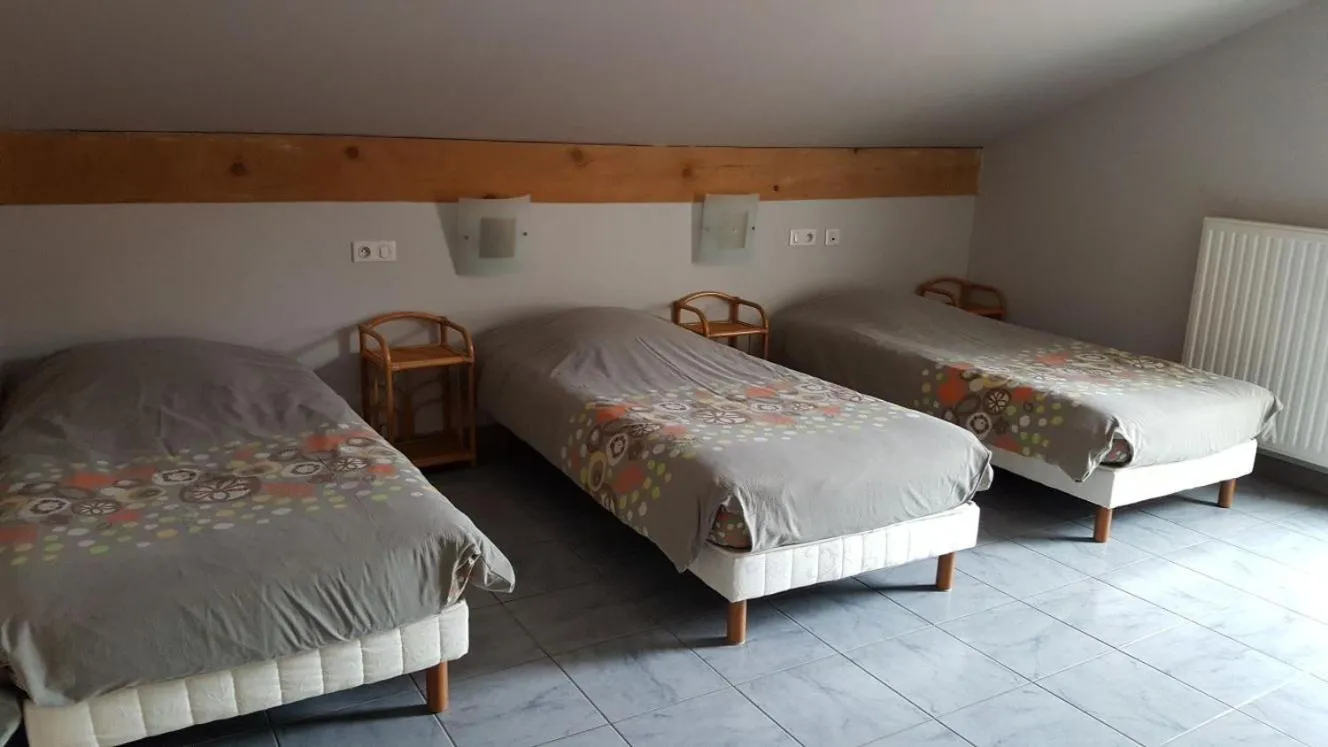 Bed in Hotel du lac des Corbeaux