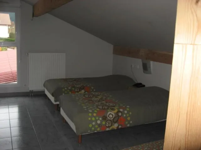 Bed in Hotel du lac des Corbeaux