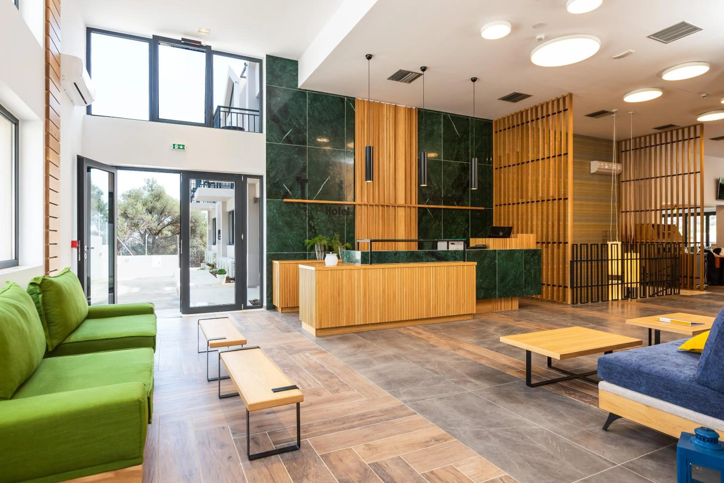 Communal lounge/ TV room in T Hotel Premium Suites