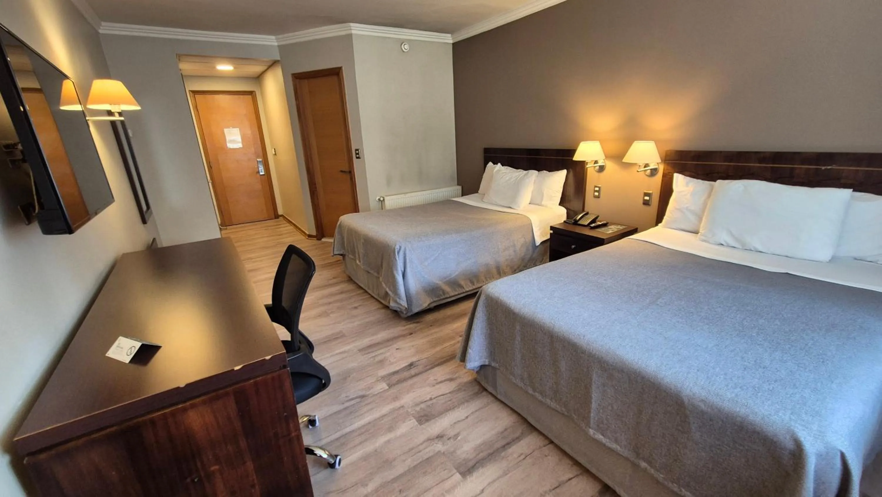 Photo of the whole room, Bed in Hotel Diego de Almagro Coyhaique