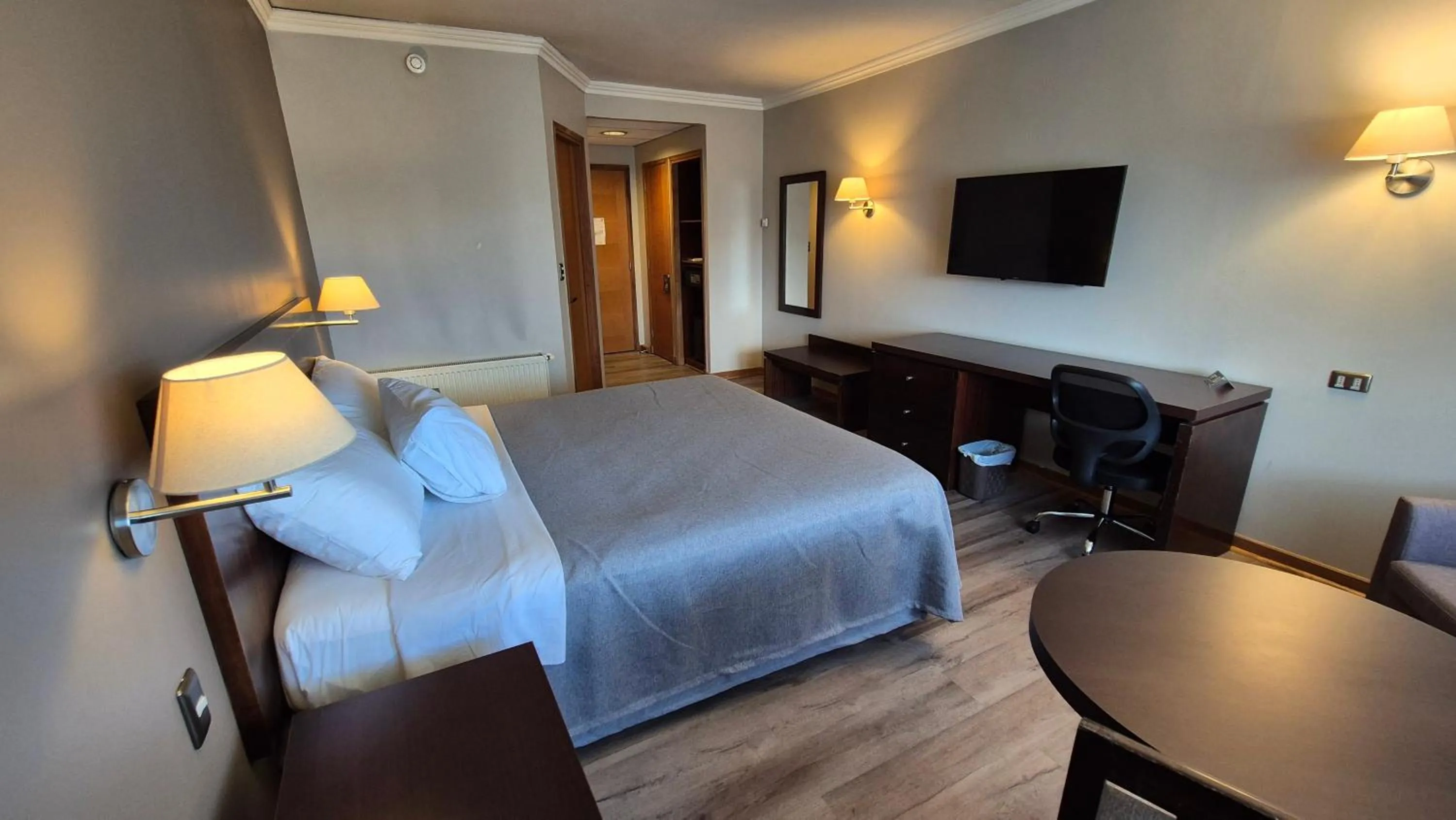 Photo of the whole room, Bed in Hotel Diego de Almagro Coyhaique