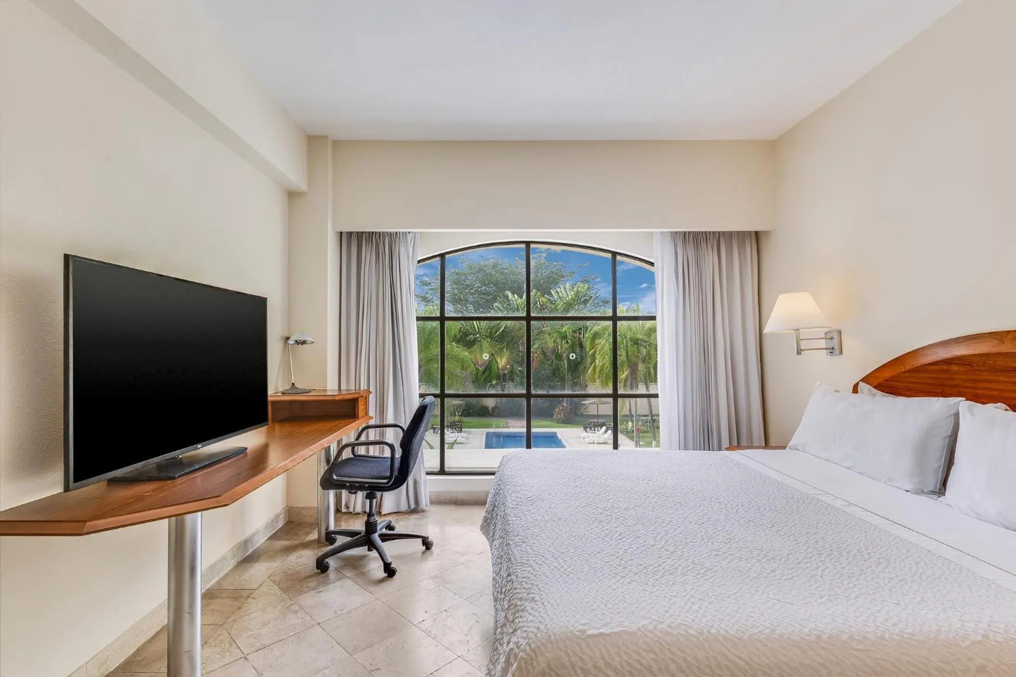 Photo of the whole room, Bed in Fiesta Inn Colima