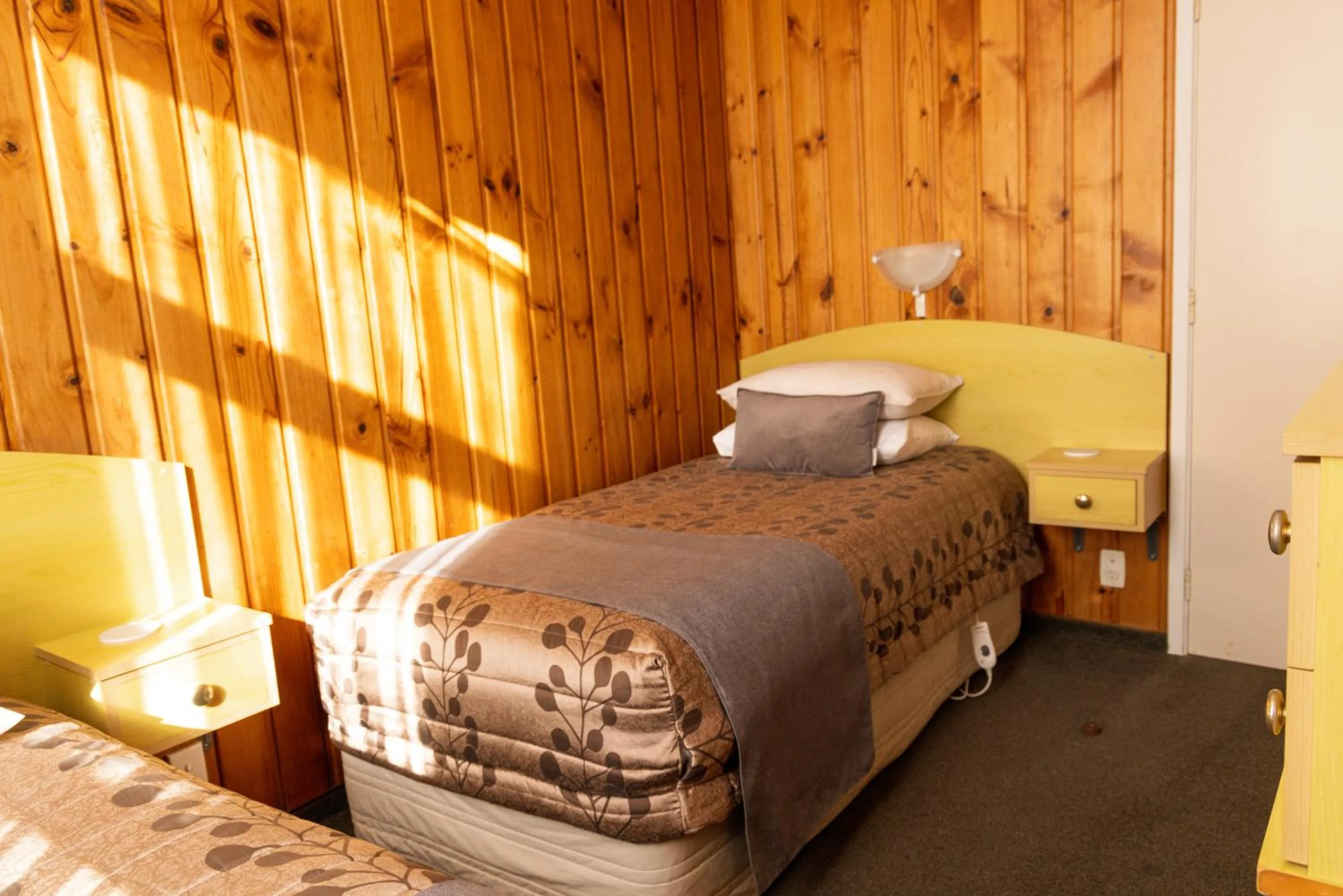 Bed in Apostles View Motel