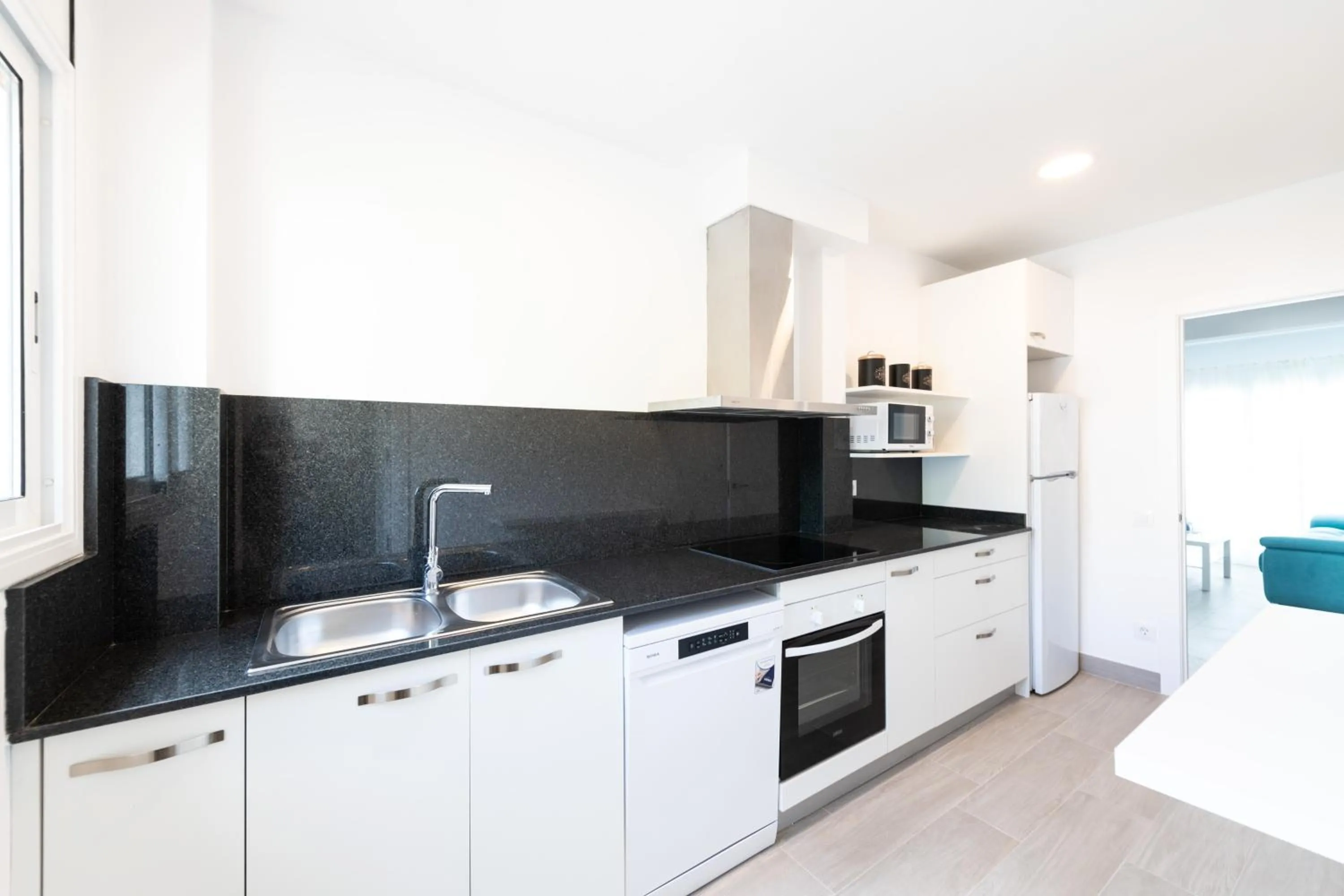 Kitchen or kitchenette in Apartamentos Marblau