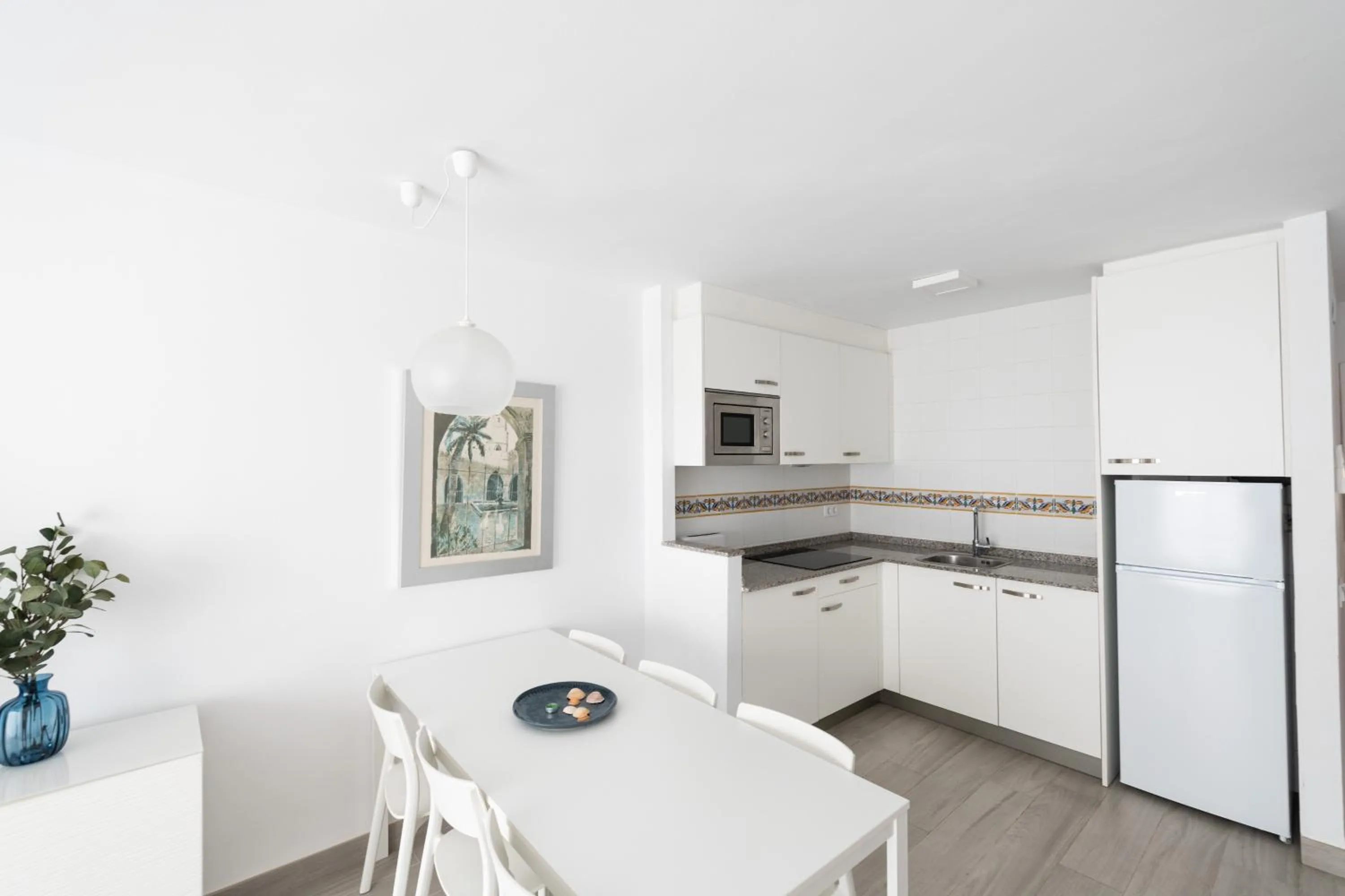 Kitchen or kitchenette in Apartamentos Marblau
