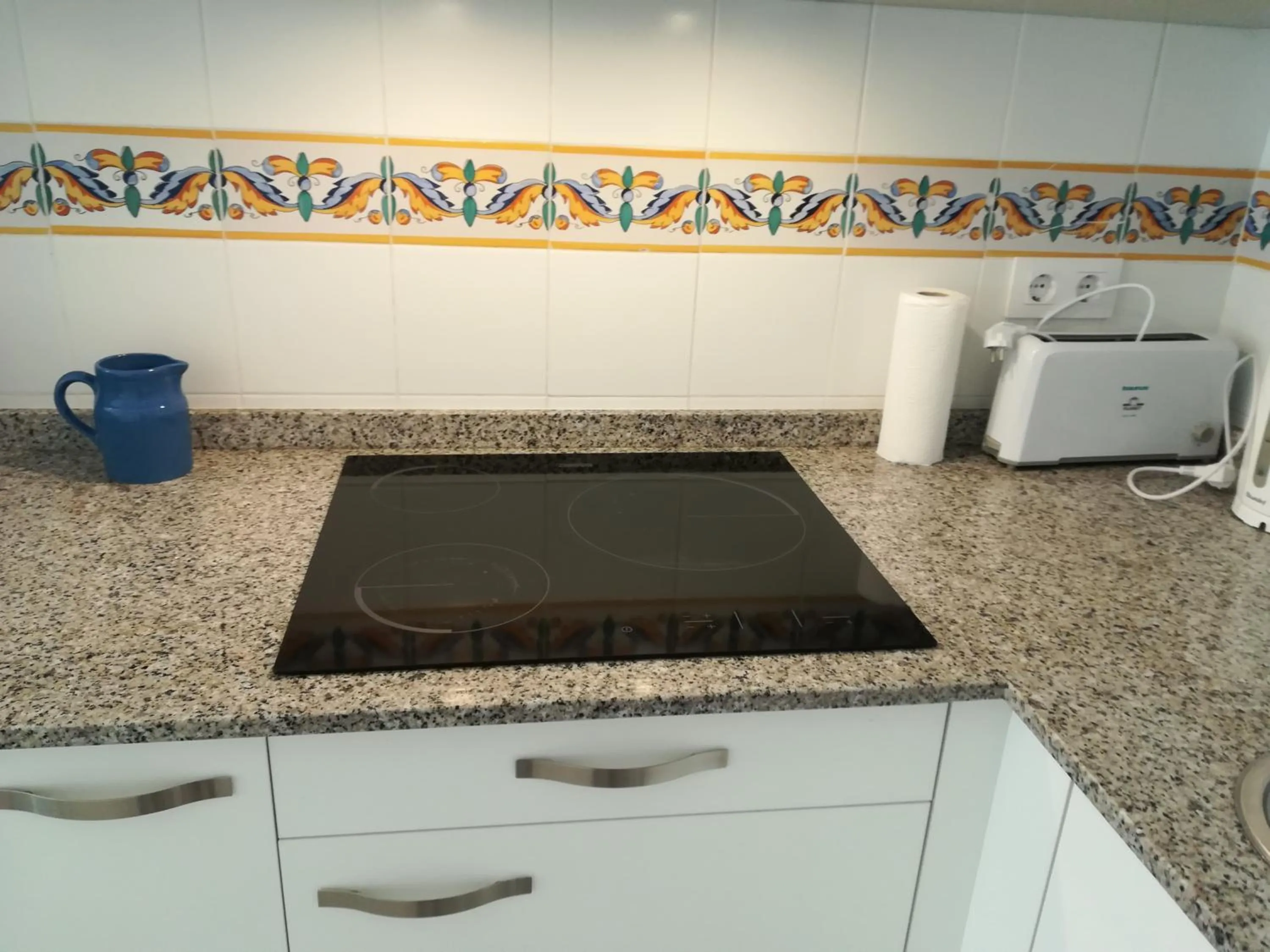 Kitchen or kitchenette in Apartamentos Marblau