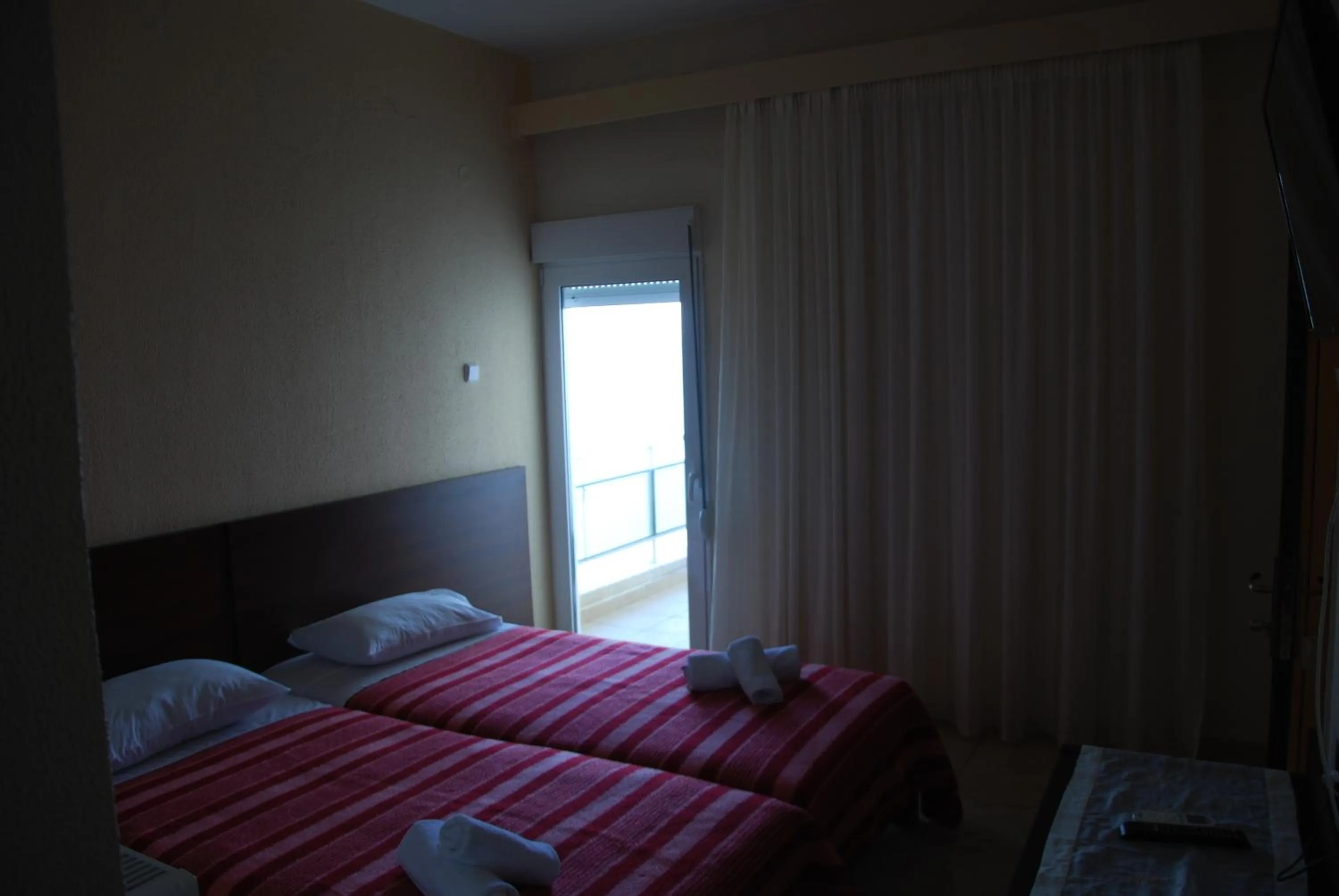 Bed in Hotel Achillion