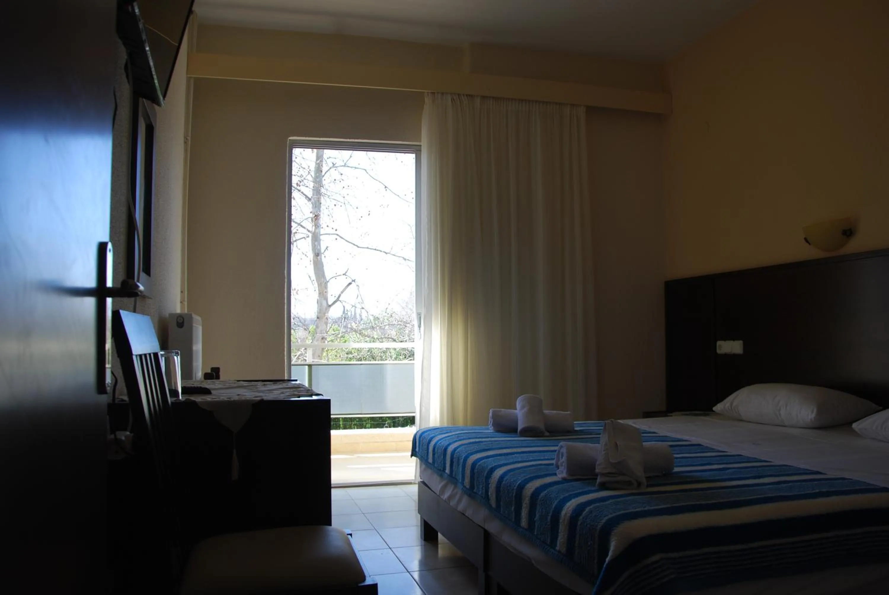 Bed in Hotel Achillion