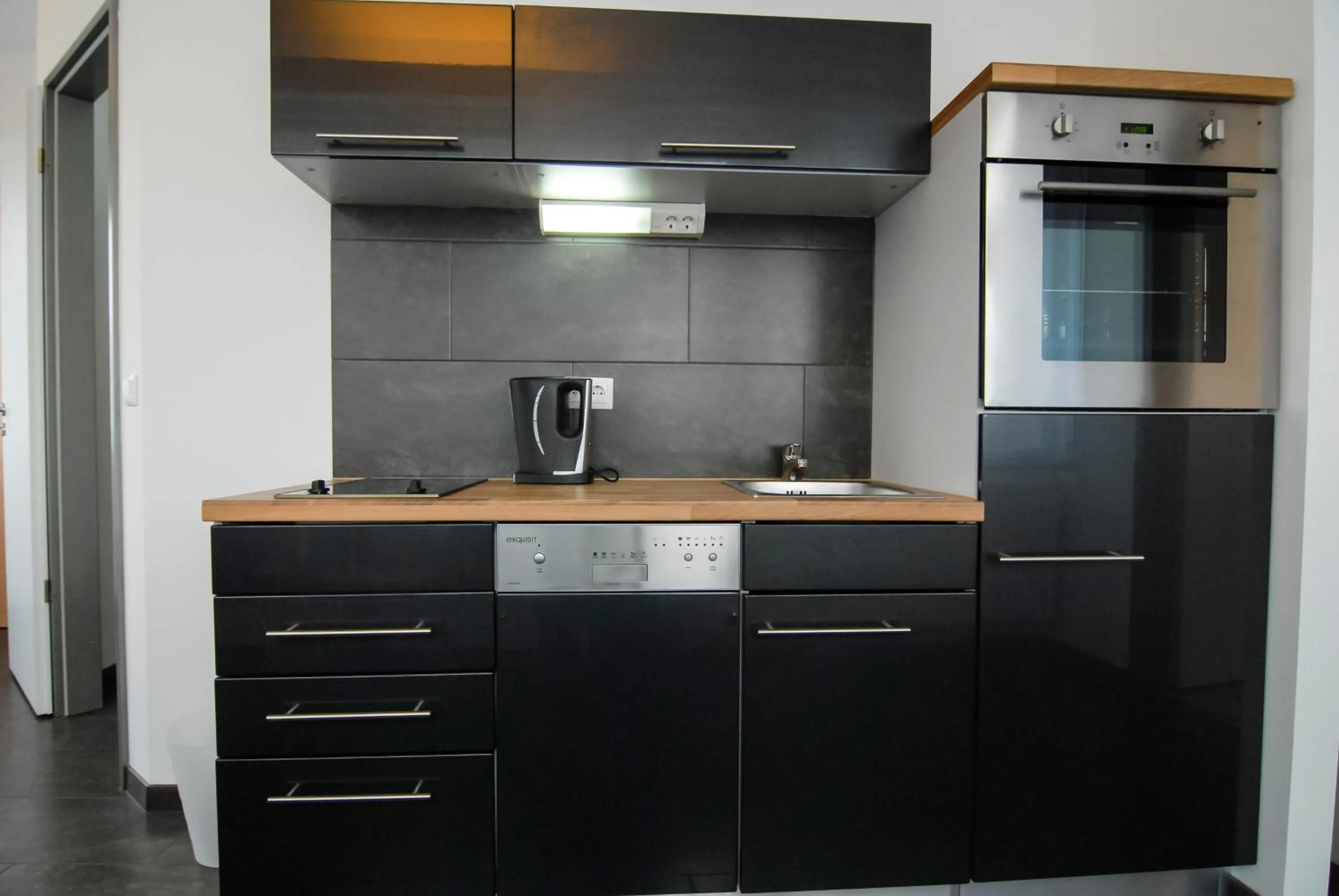 Kitchen or kitchenette in Petul Apart Hotel Am Ruhrbogen