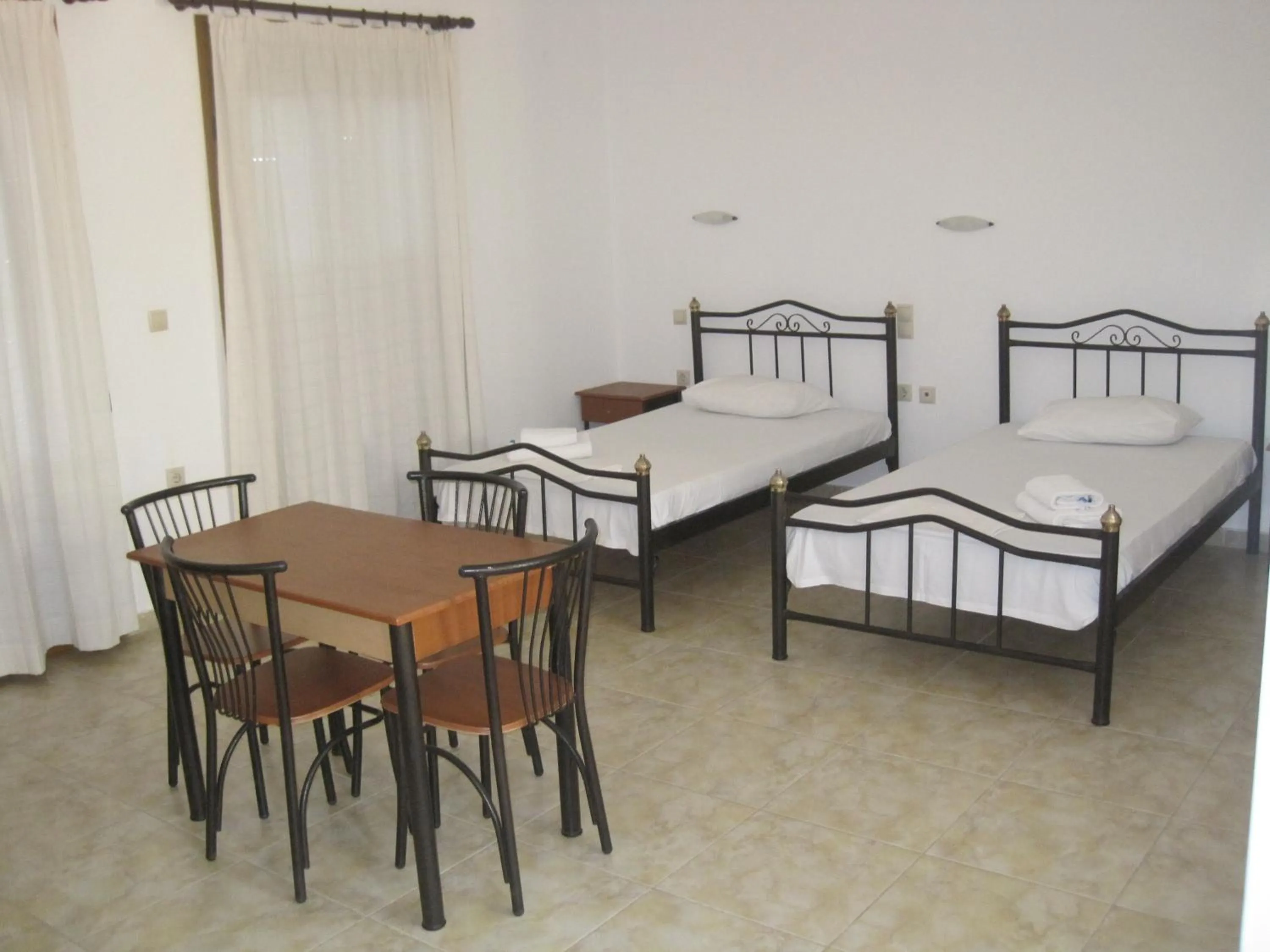 Photo of the whole room, Bed in Sfinias Apartments