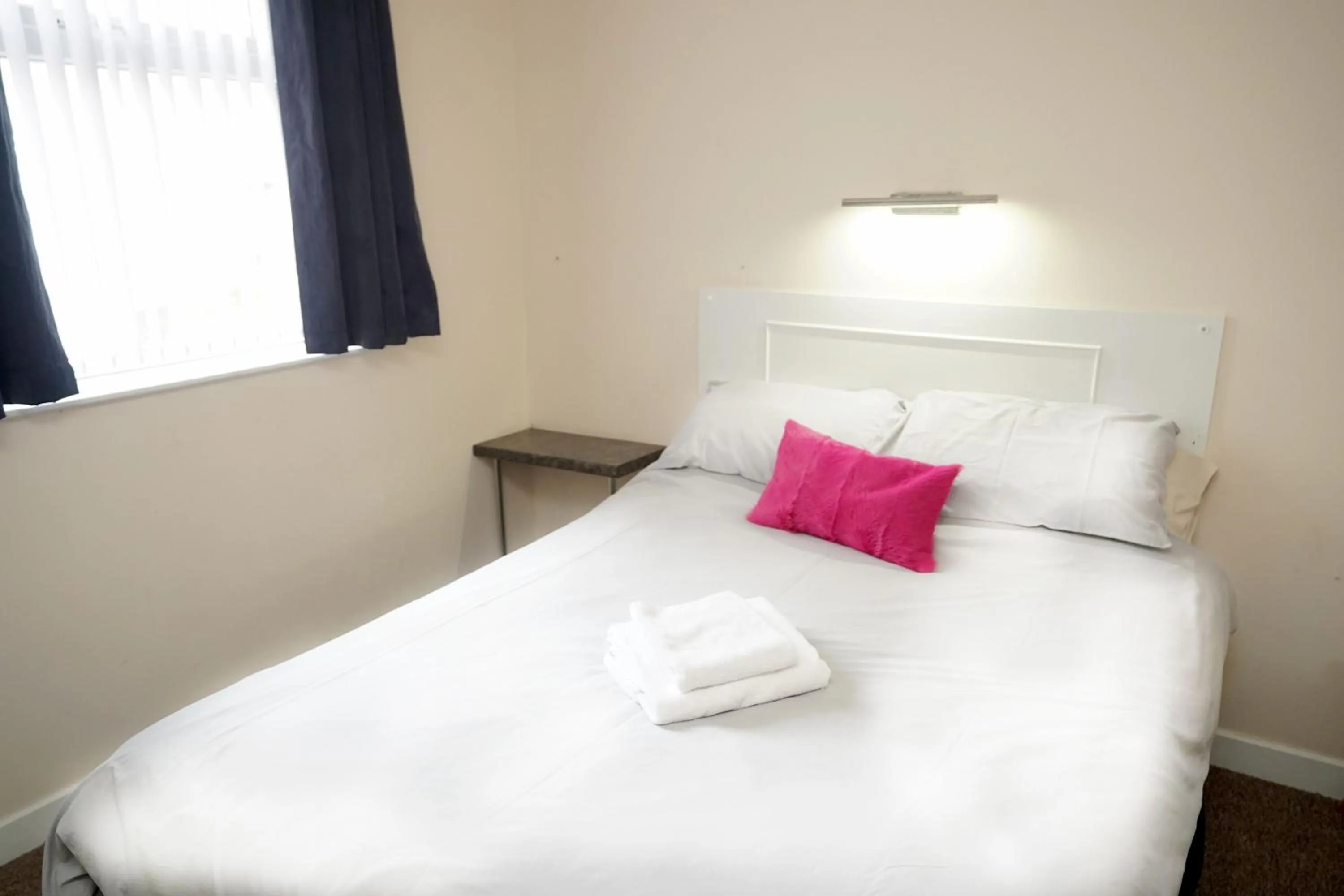 Bed in The Rollason Hotel