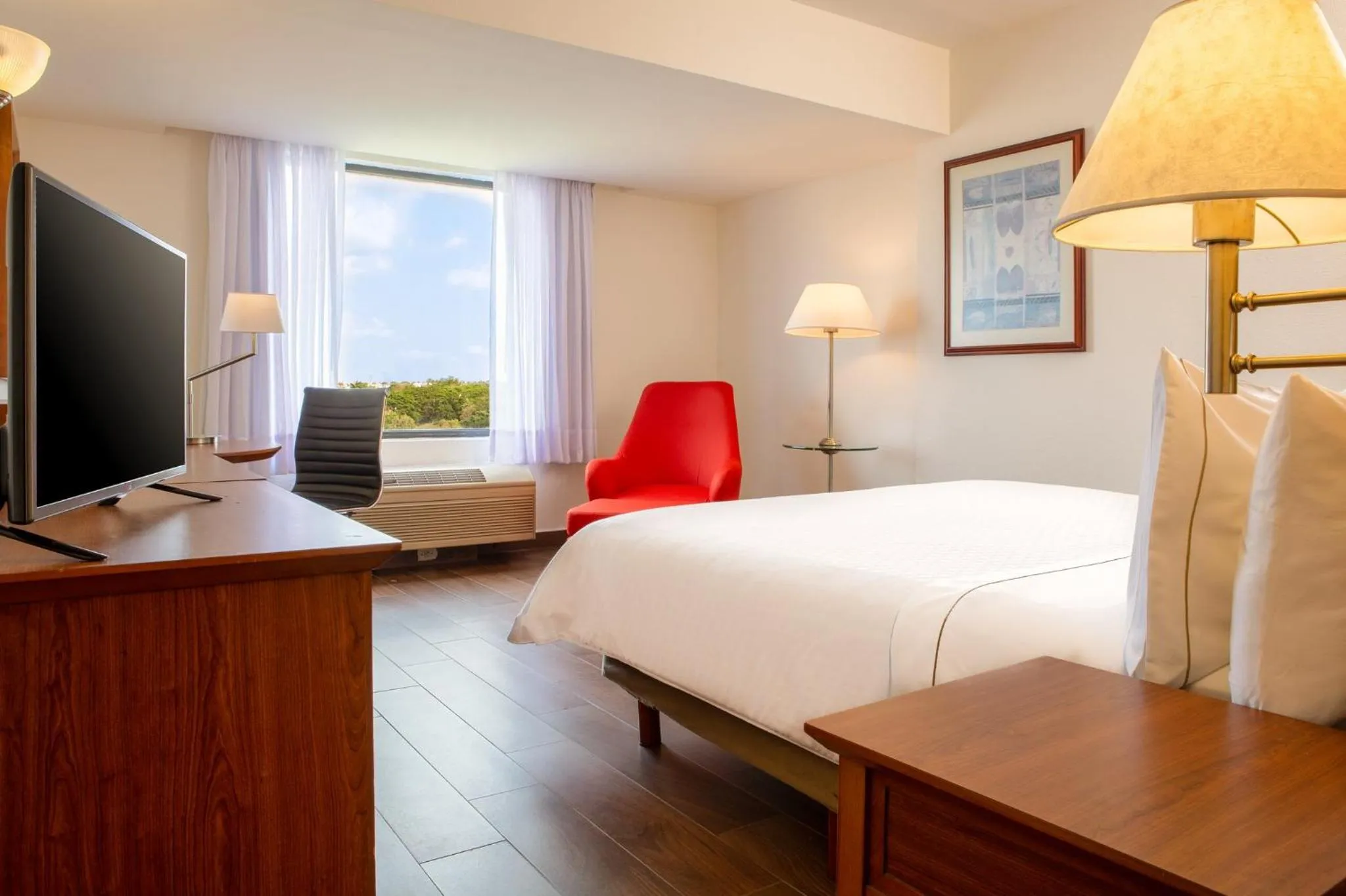 Photo of the whole room, Bed in Fiesta Inn Tampico