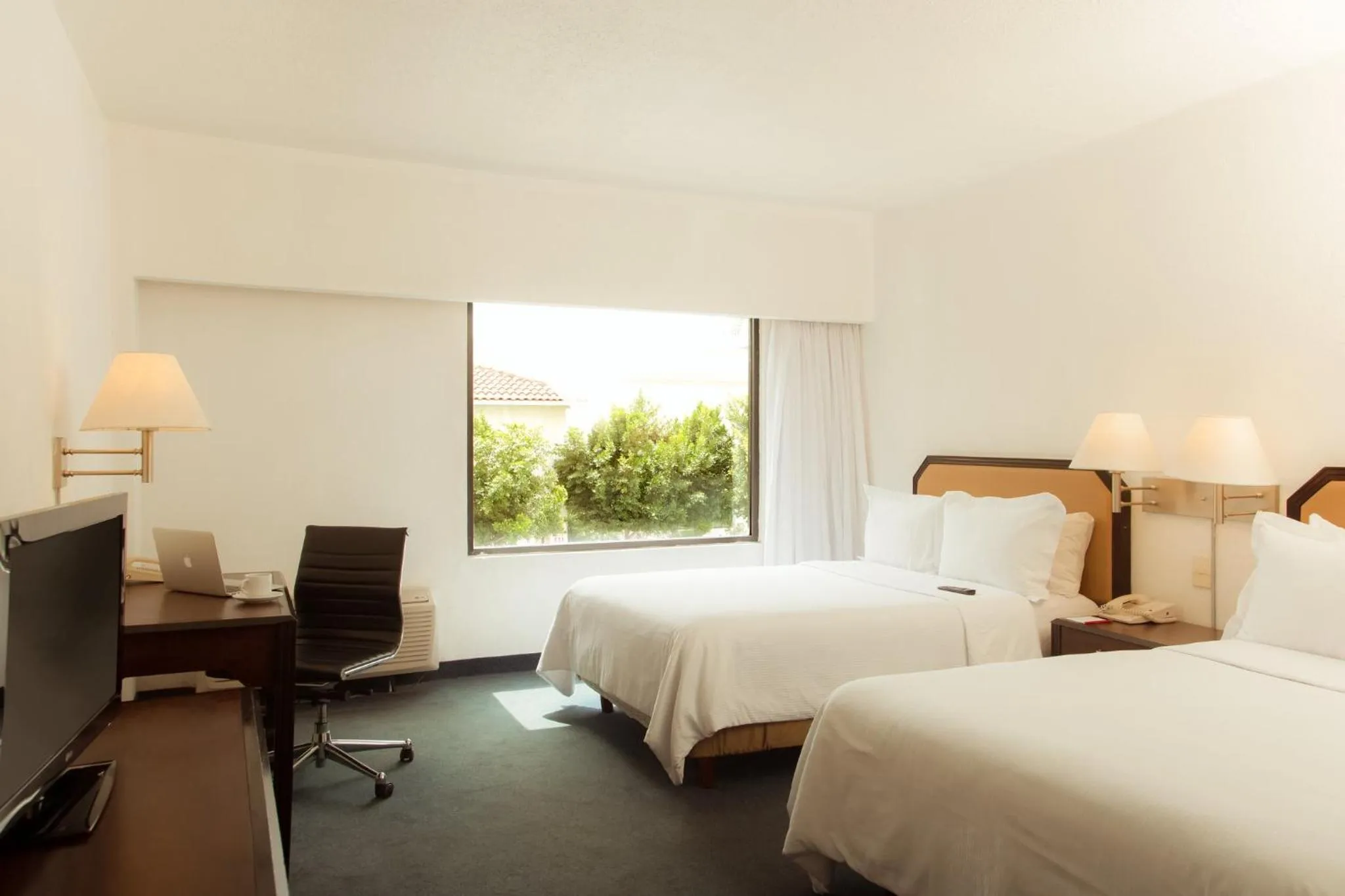 Photo of the whole room, Bed in Fiesta Inn Monclova