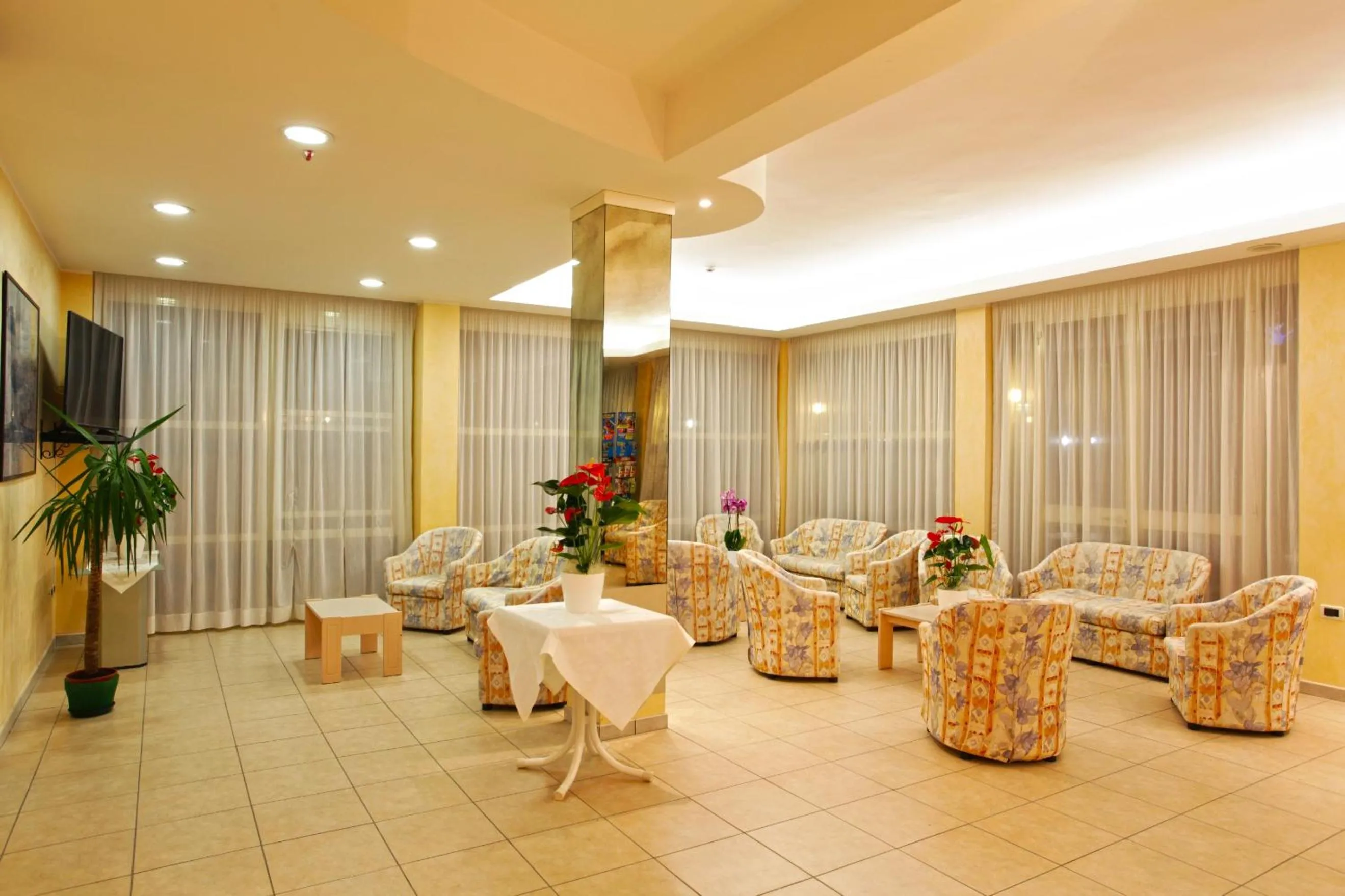 Communal lounge/ TV room in Hotel Santa Maria