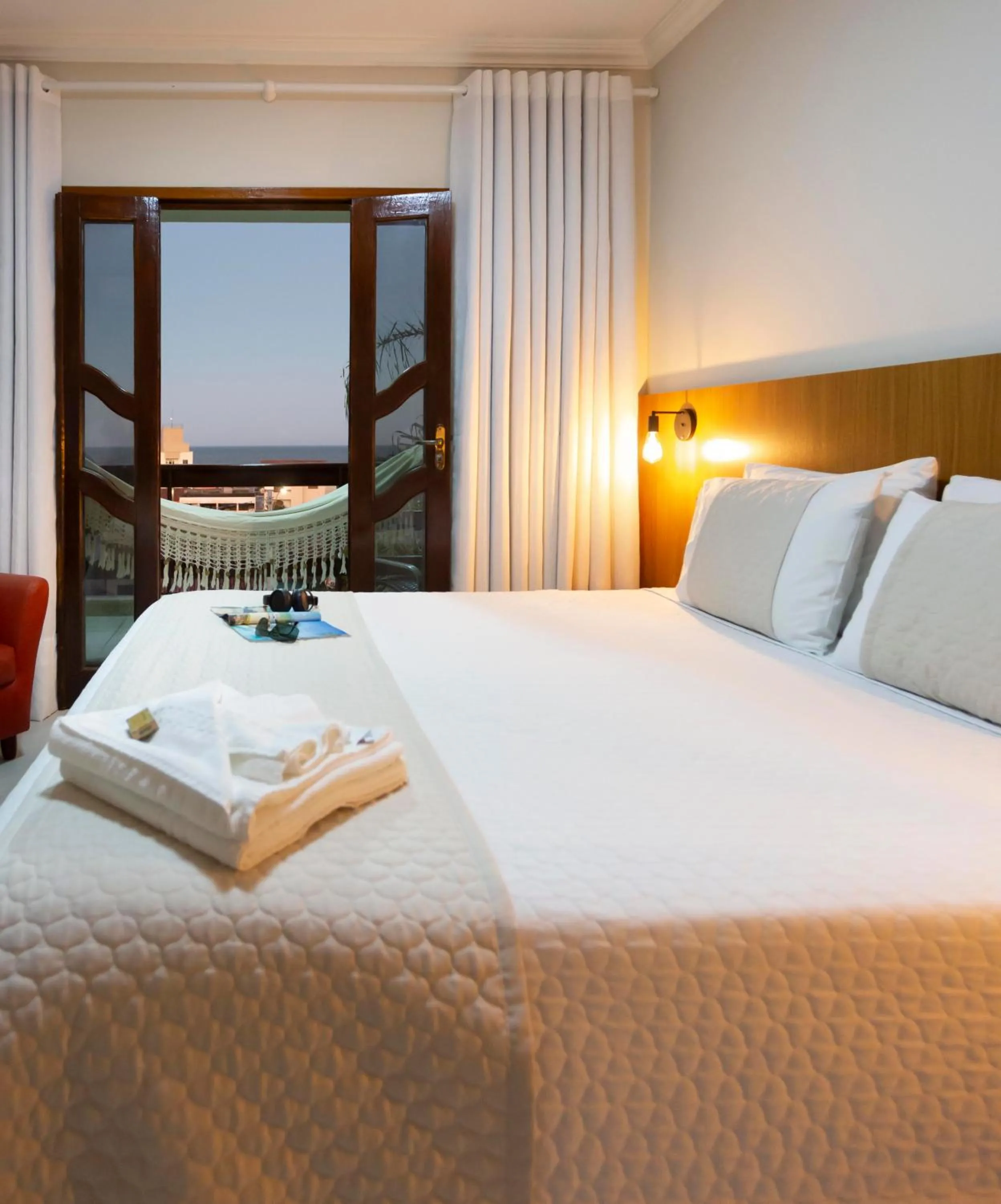 Bed in Pousada Timoneiro