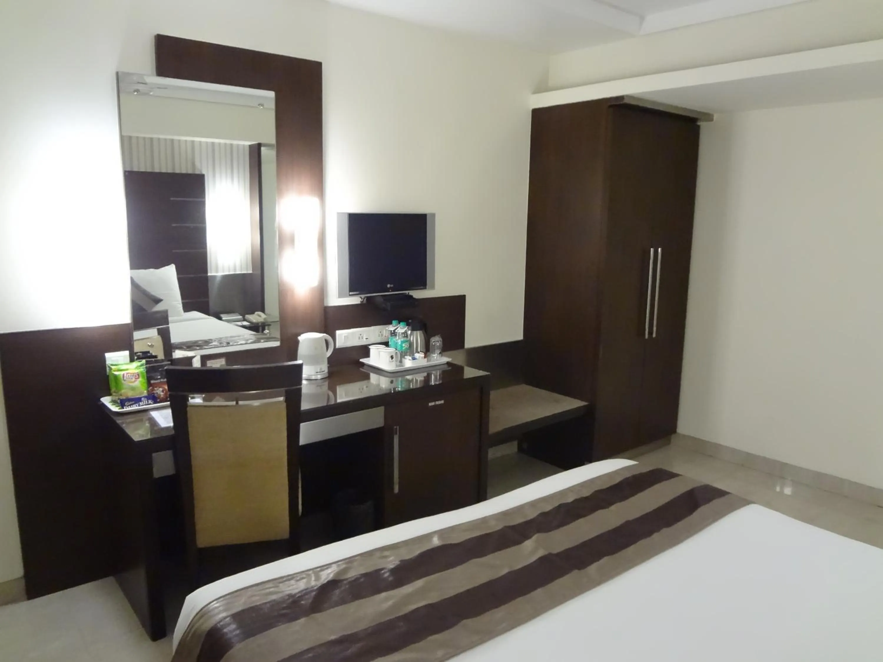 Decorative detail, Bed in Hotel Suba Galaxy Mumbai