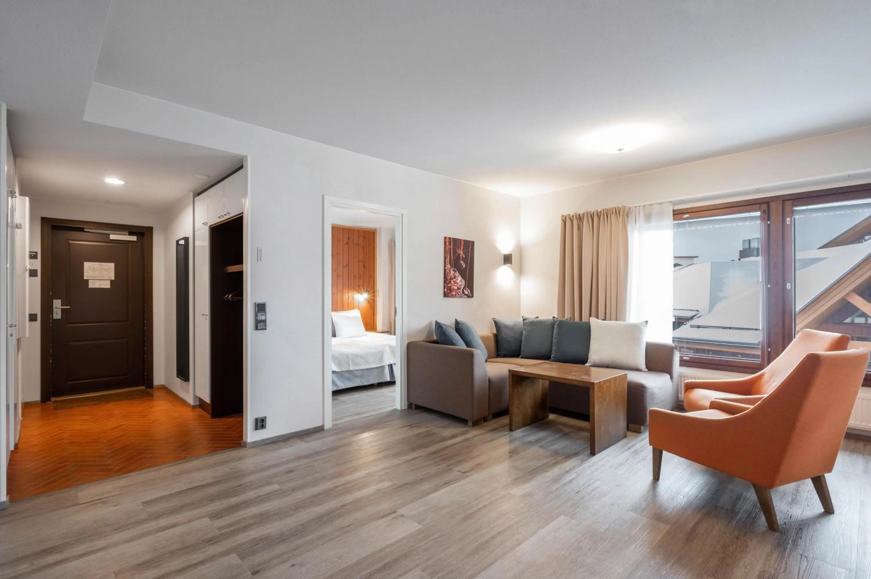 Seating area, Bed in Ski-Inn RukaVillage