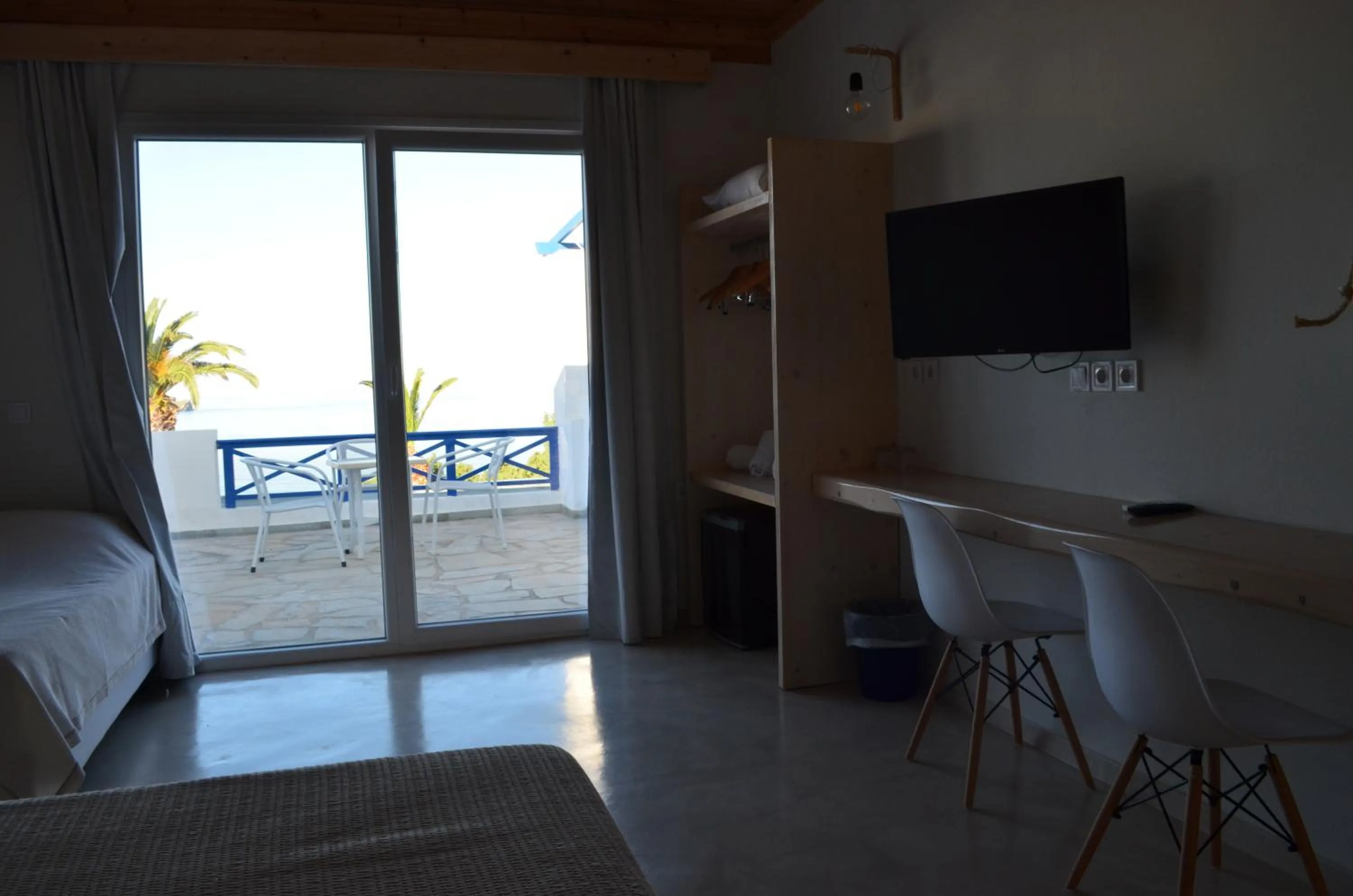 Seating area, Bed in Faros Resort