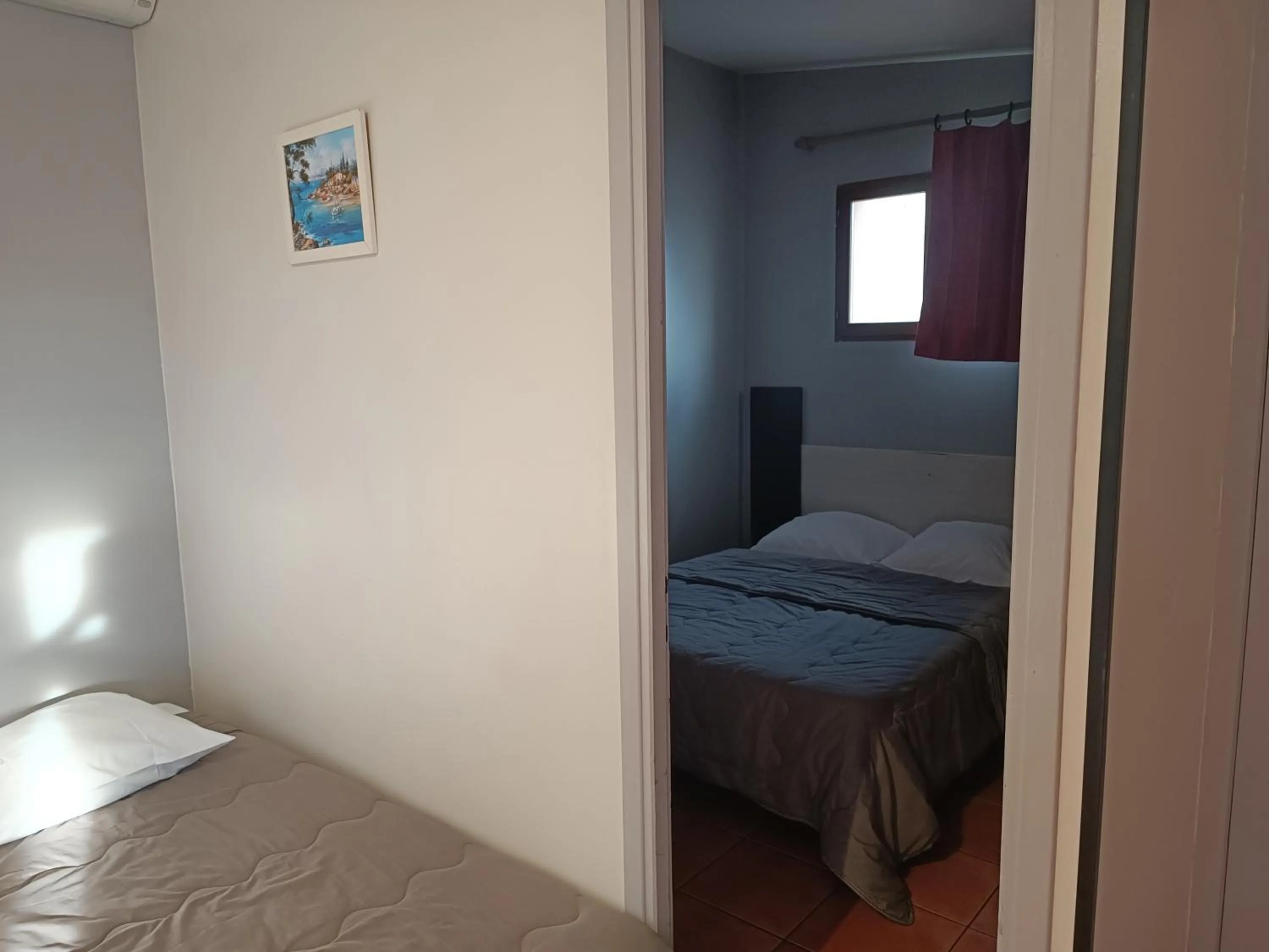 Bed in Hôtel L'Hacienda