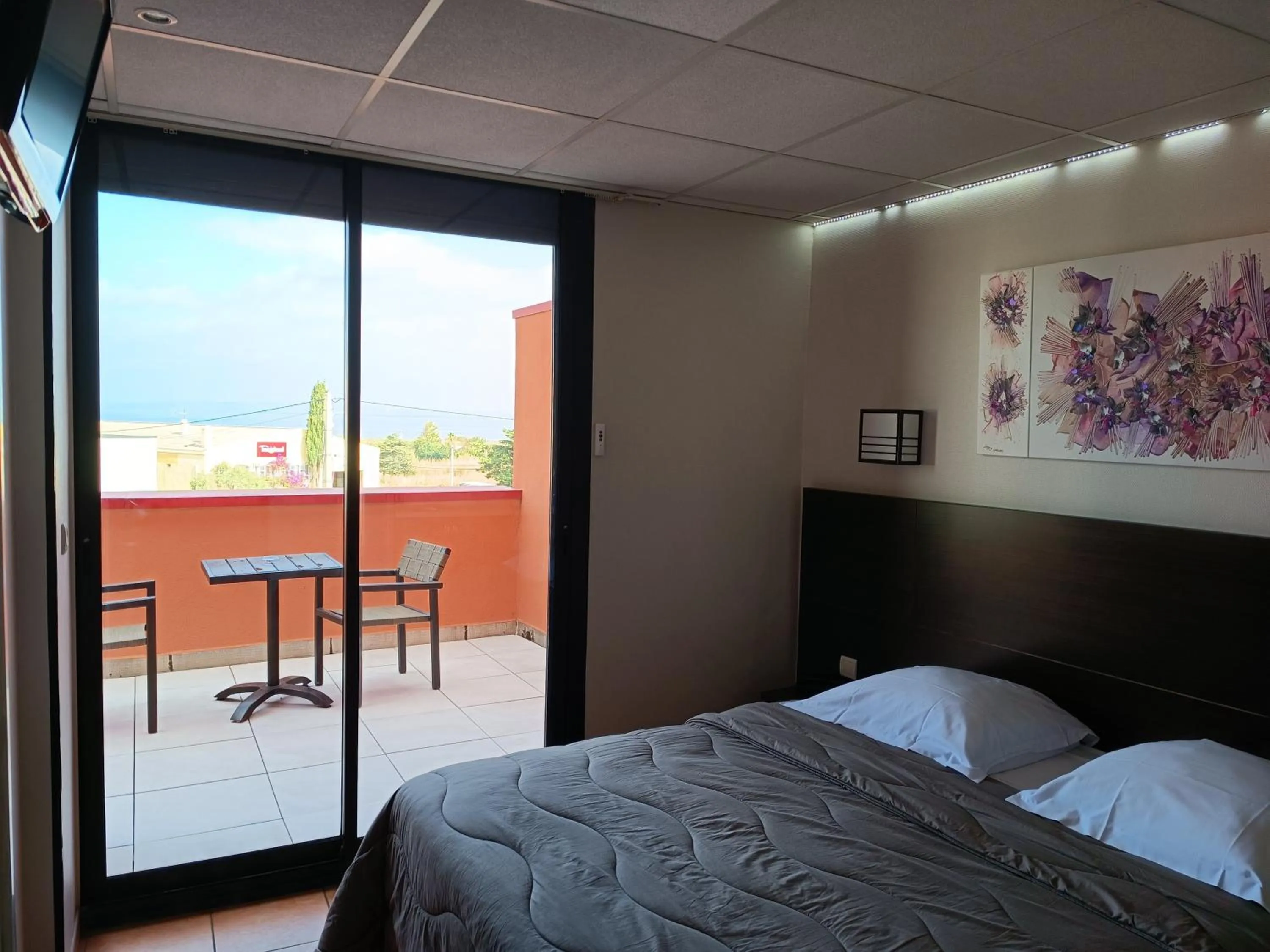 Bed in Hôtel L'Hacienda