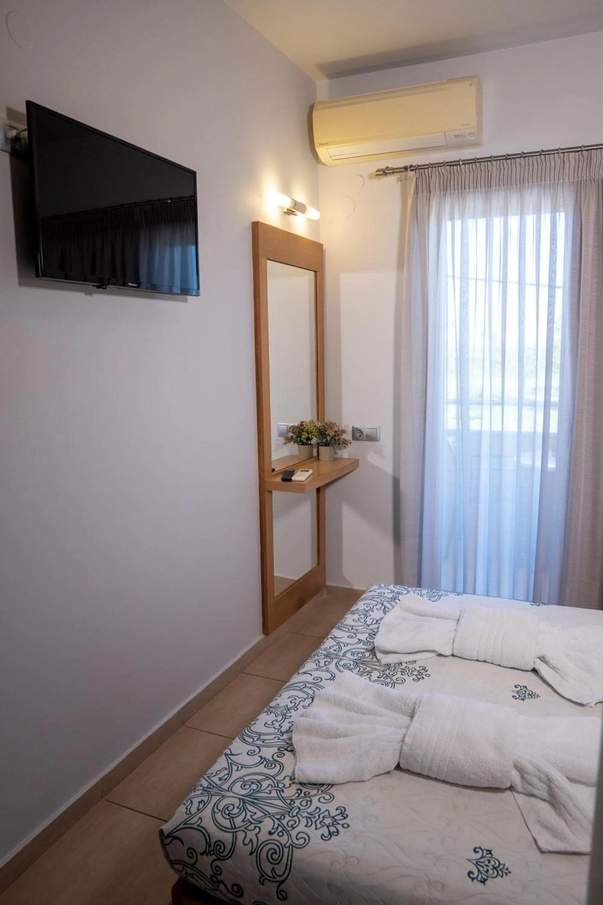 Bed in Hotel Epavlis Eleftheriadi