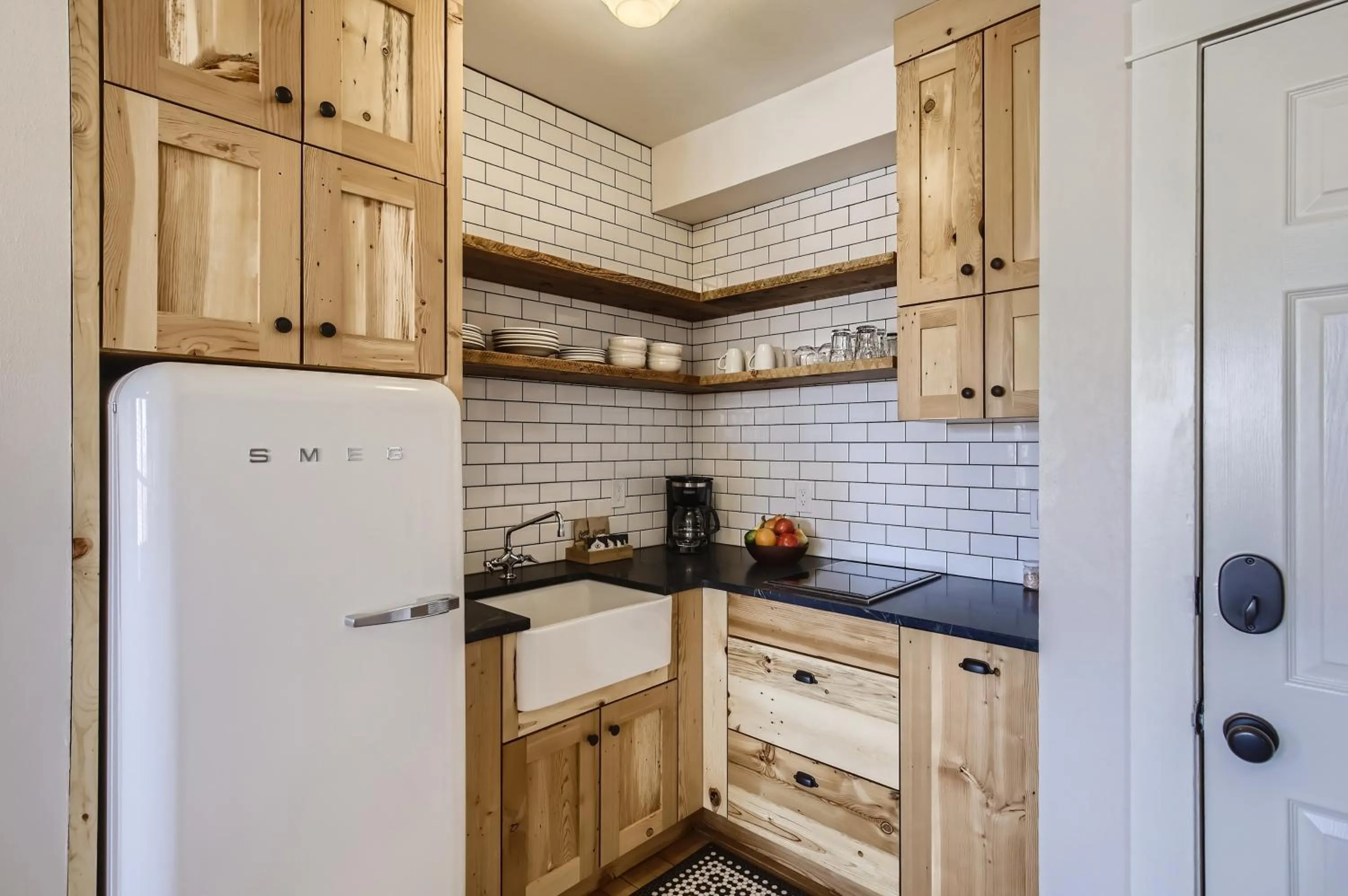 Kitchen or kitchenette in Colorado Chautauqua Cottages