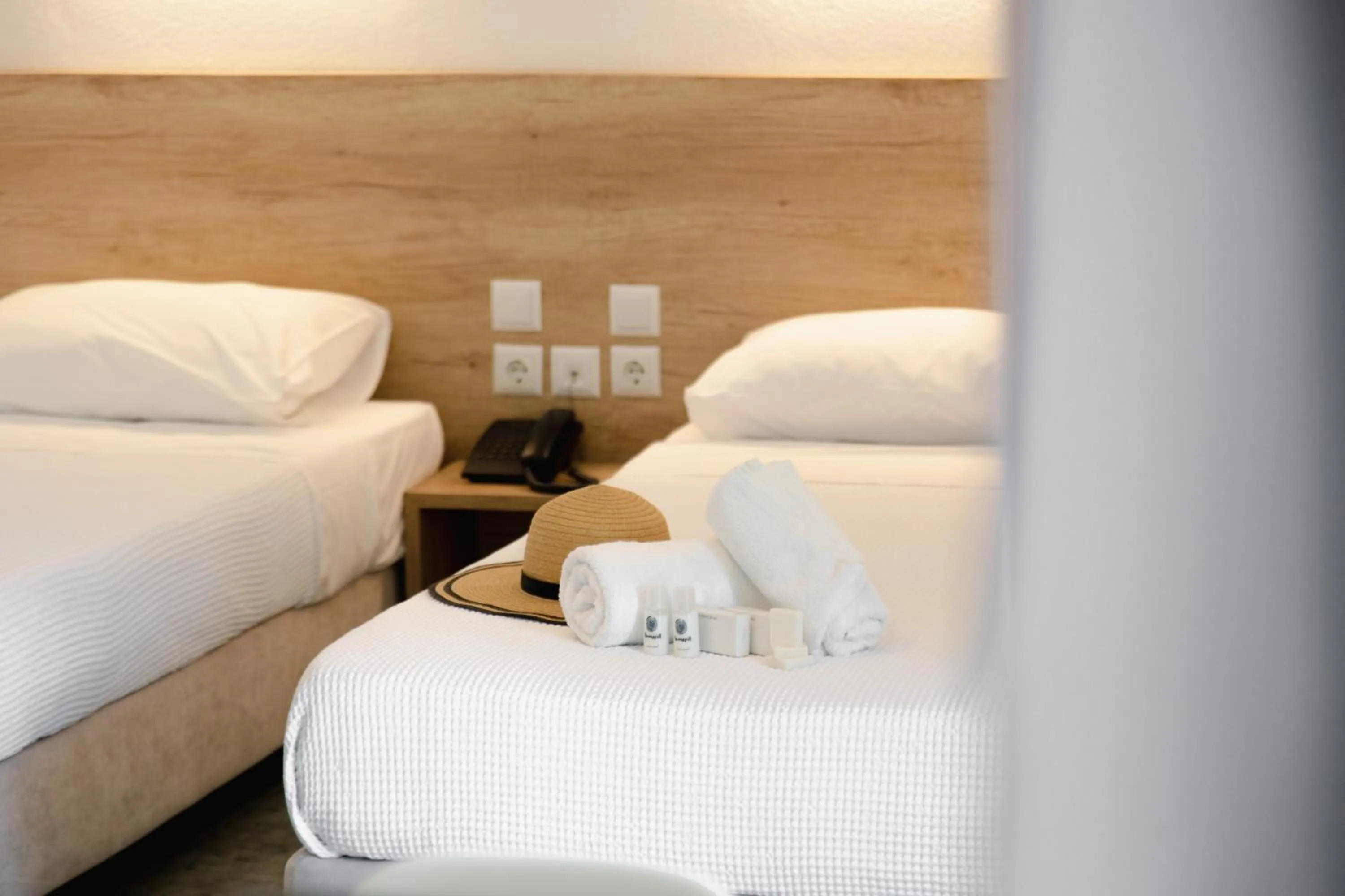 Bed in Calma Beach Hotel