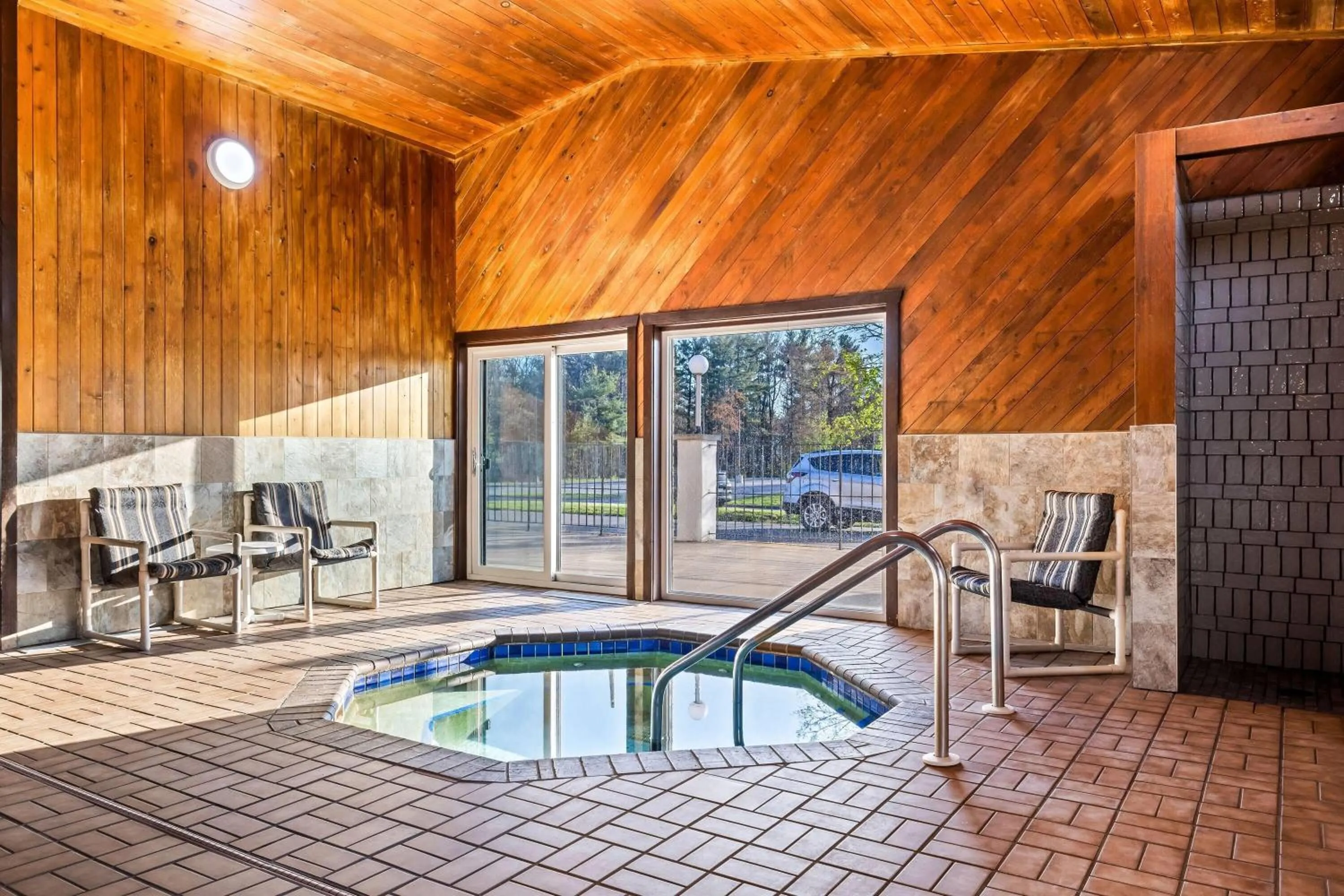 Swimming pool in Days Inn by Wyndham Black River Falls - Access to ATV Trail