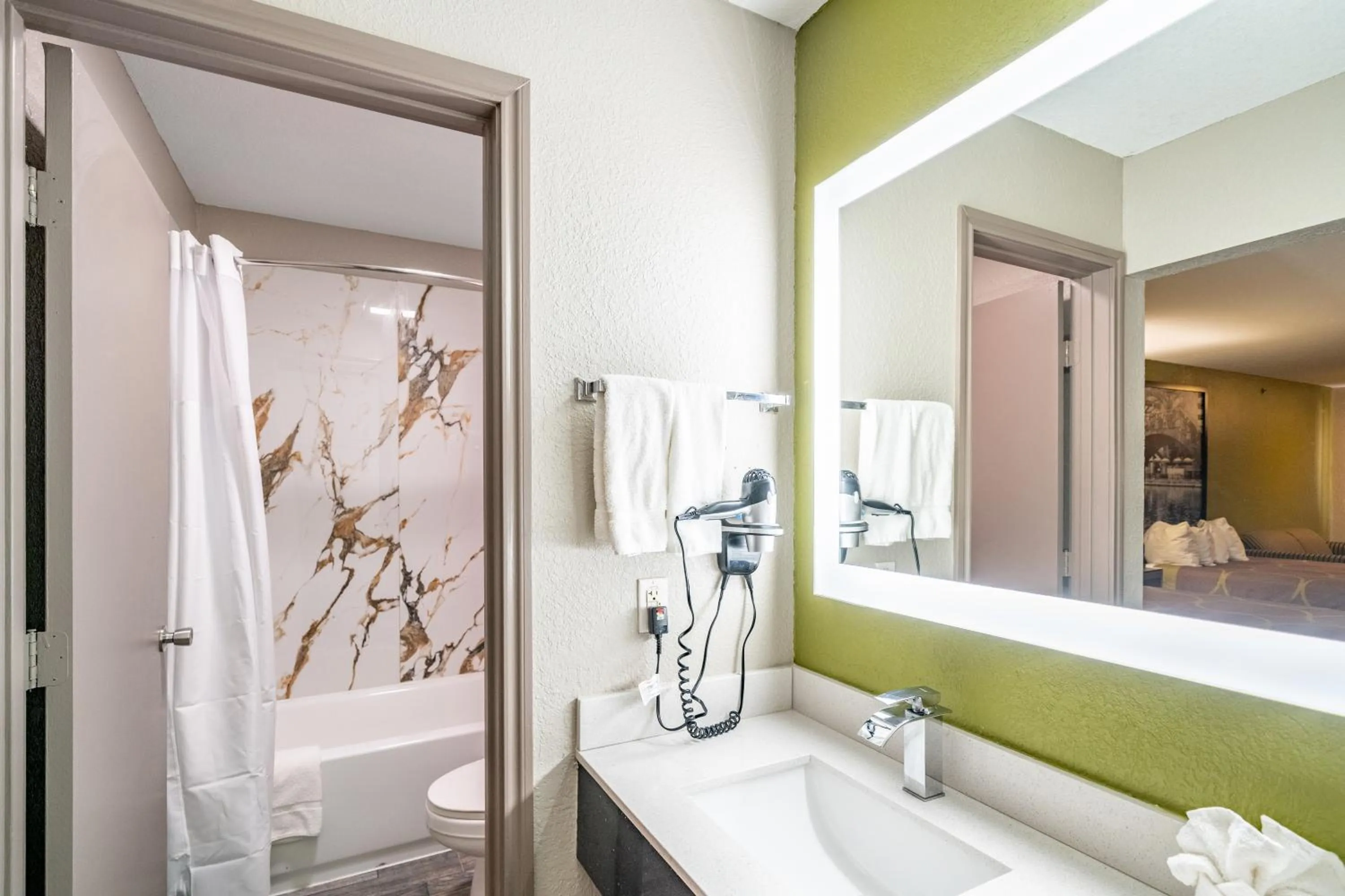 Bathroom in Super 8 by Wyndham San Antonio/Riverwalk Area