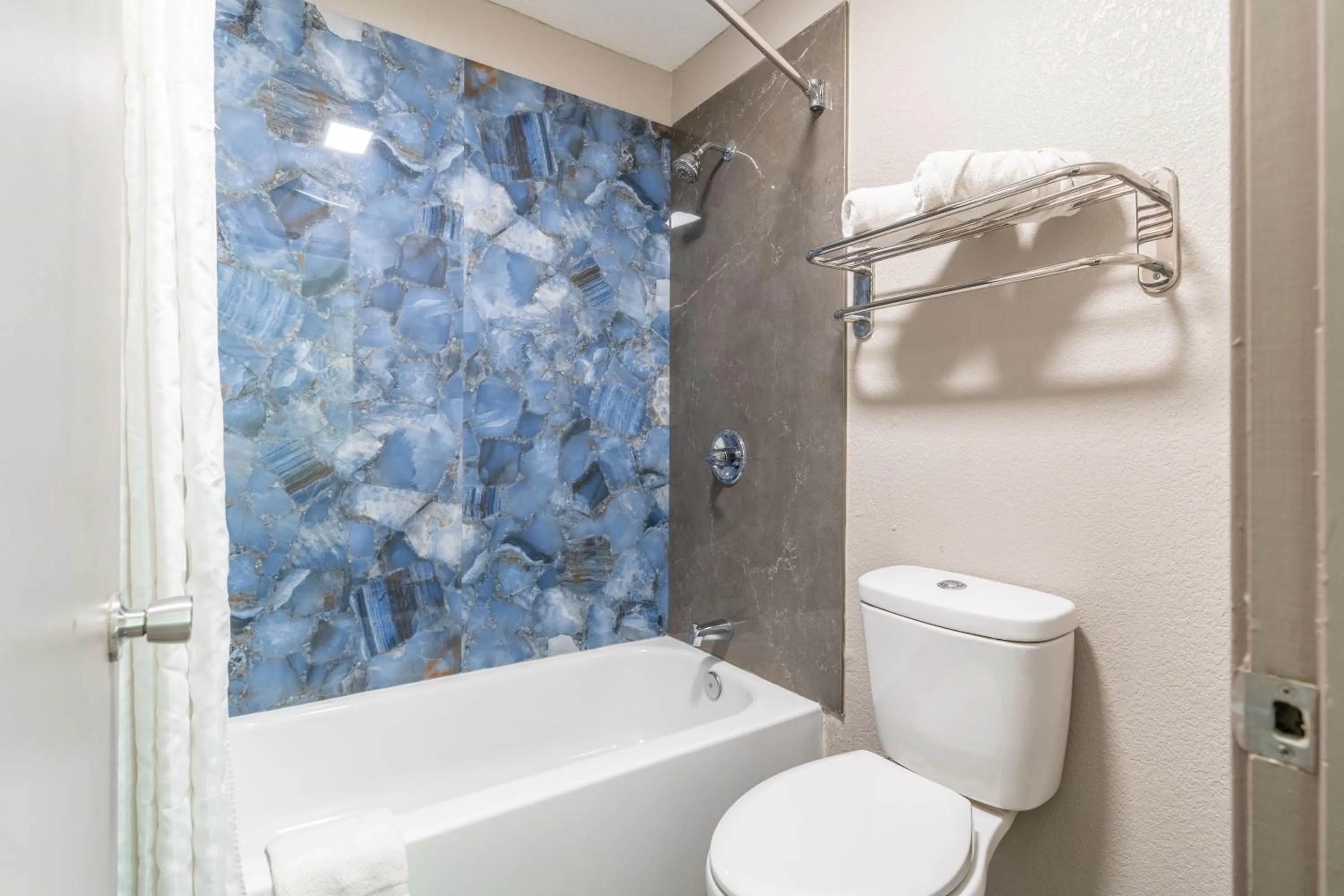 Toilet in Super 8 by Wyndham San Antonio/Riverwalk Area